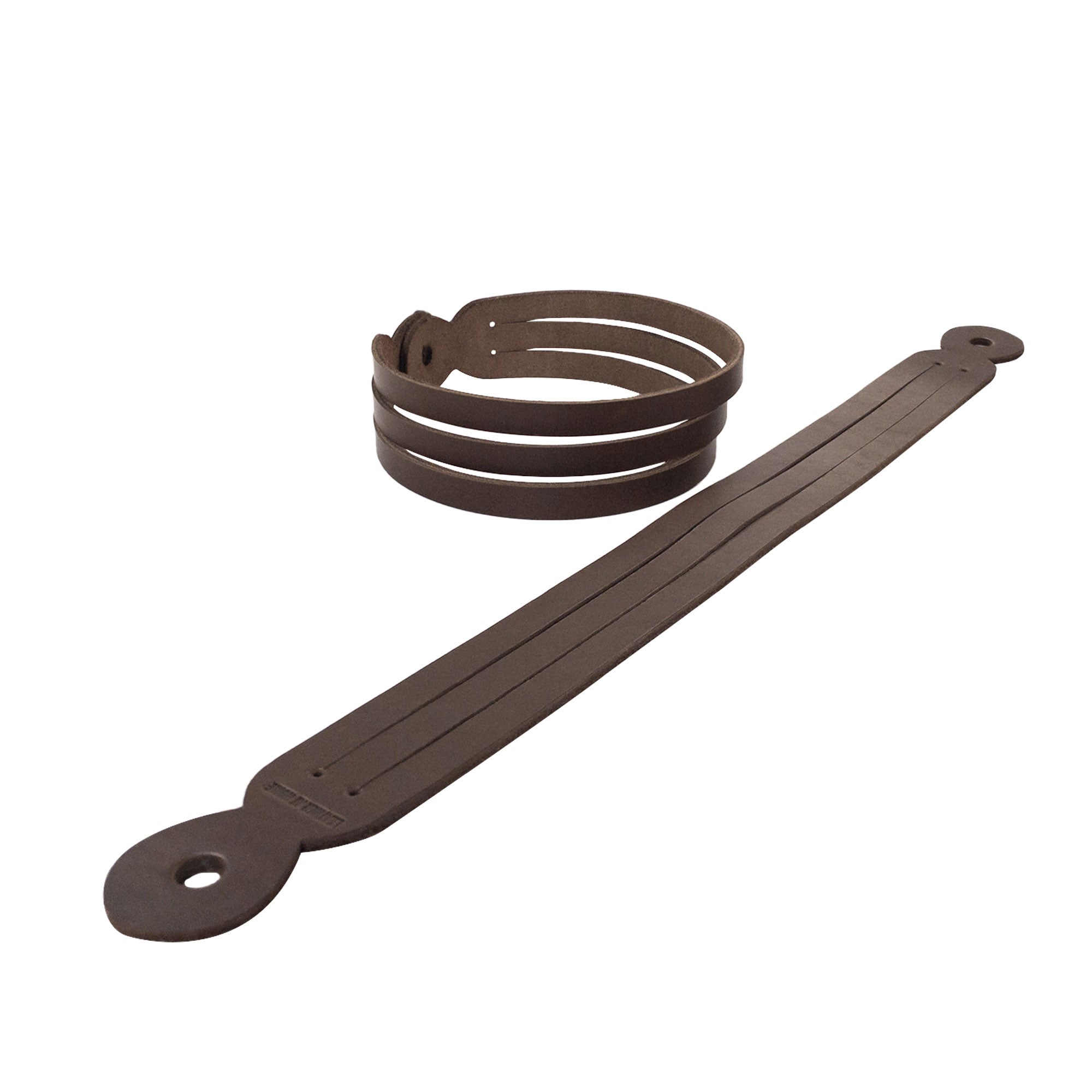 Brown Curtain Tie Back (2 Pack) featuring a combination of a long strap and circular holder, made from thick full grain leather. Each product by Leather At Home is handmade, showcasing the small batch production and artisan quality.