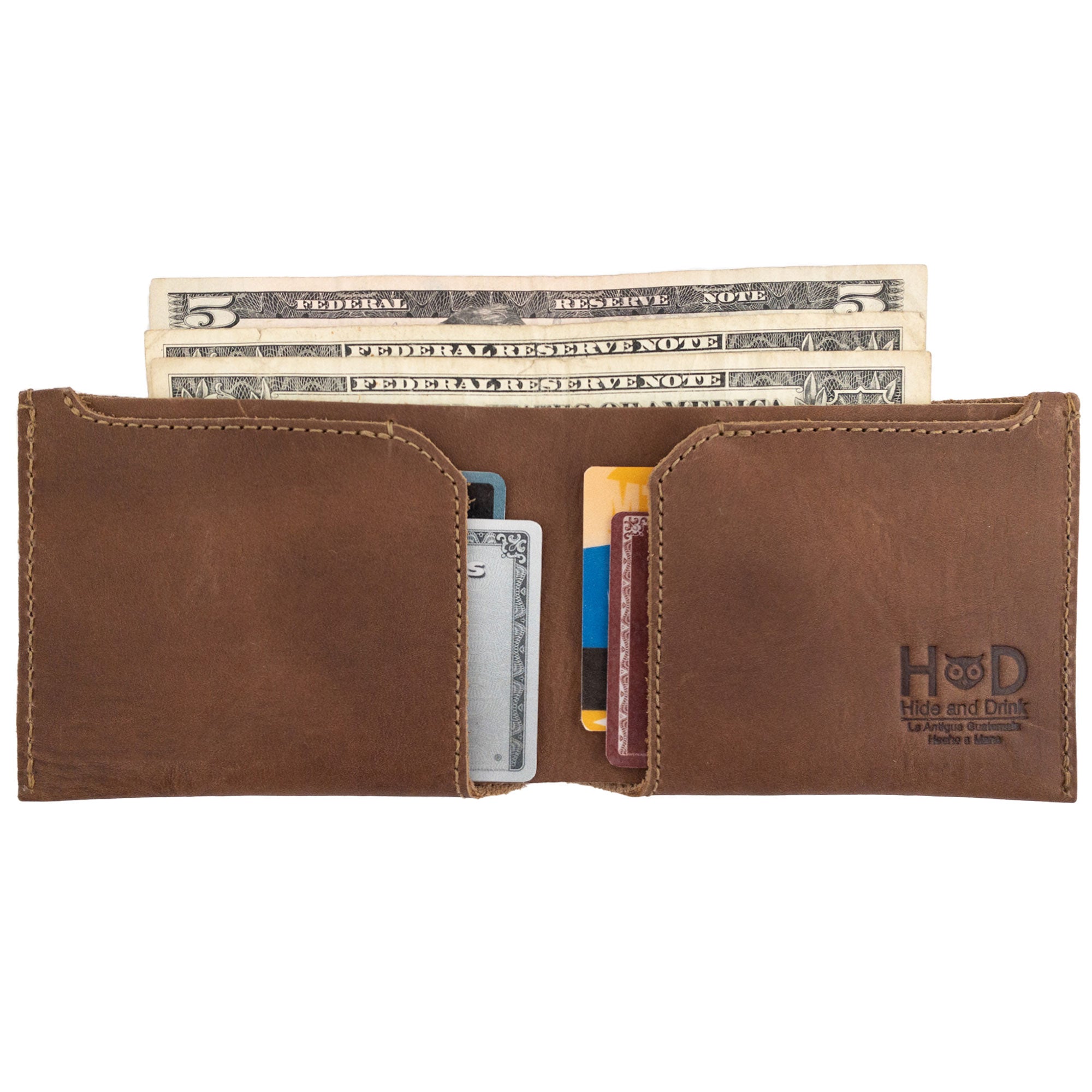 Front view of a brown Hide & Drink Classic Wallet with visible stitching details, showcasing quality craftsmanship and artisan production. Classic Wallet, Card Organizer, Money Holder, Vintage Pocket, Travel Accessories, Full Grain Leather, StockyardX, Small Batch Production, Hand Cut, Hand Sewn, Fire Branded, Artisan, Handmade in La Antigua Guatemala & Oaxaca Mexico.