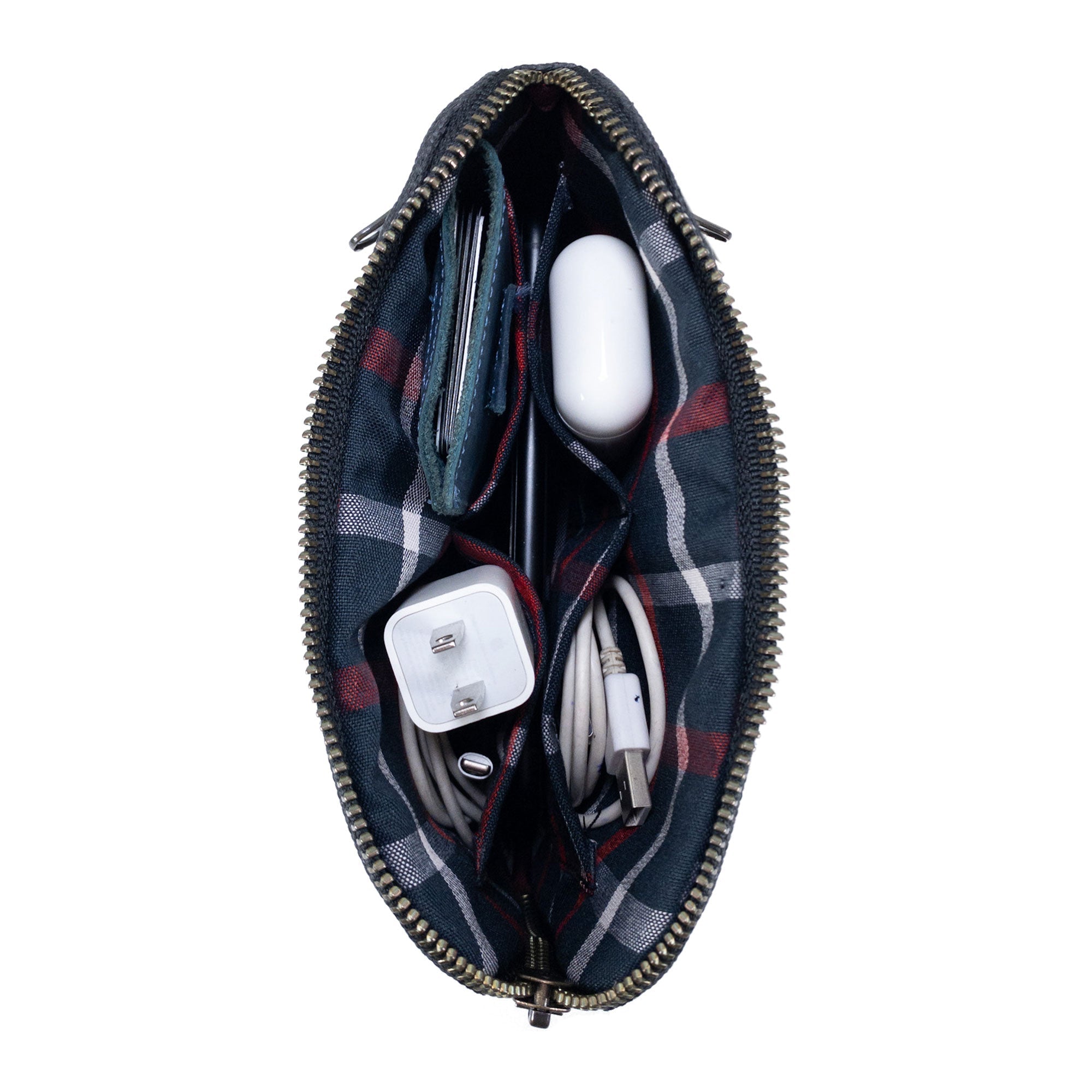 Interior view of Hide & Drink's dark brown Zipper Gear Pouch showcasing its ample compartments for versatile storage, highlighting its handmade craftsmanship.