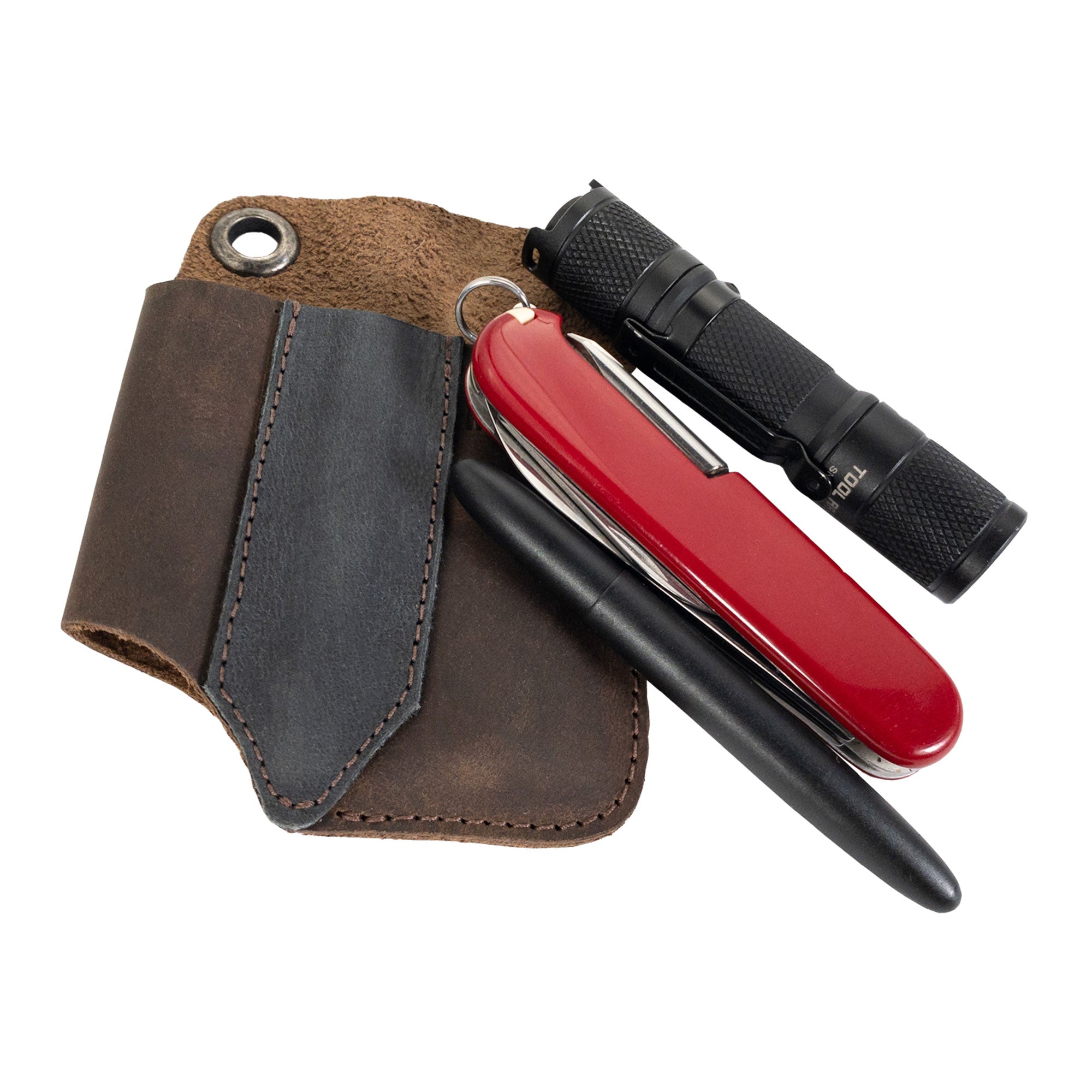 An angled view of the Compact EDC Tool Holster by Valhalla Gear, focusing on its craftsmanship and materials. This pocket case, made from full grain leather, is the quintessential rustic sleeve for tools, showcasing artisan quality.