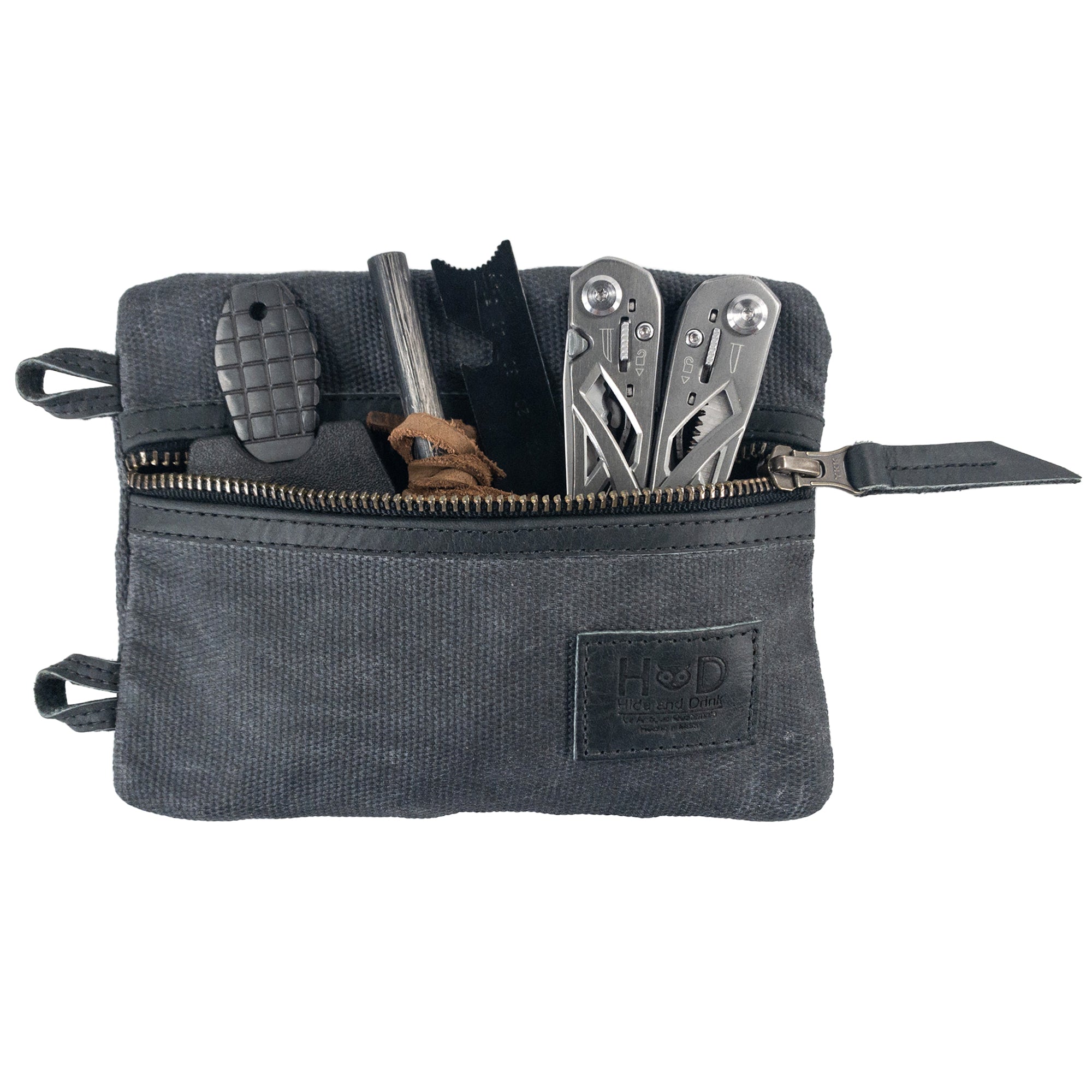 Multi-tool Pocket Pouch - XL by Hide & Drink displayed alongside a business card, showcasing its suitability as a thoughtful gift for outdoor enthusiasts and tool lovers. Multi-Tool Pocket Pouch XL, Compact Multipurpose EDC Zippered Bag, Knife Holster, Handmade Slim Organizer, Waxed Canvas, StockyardX, Small Batch Production, Artisan, Handmade in La Antigua Guatemala & Oaxaca Mexico.