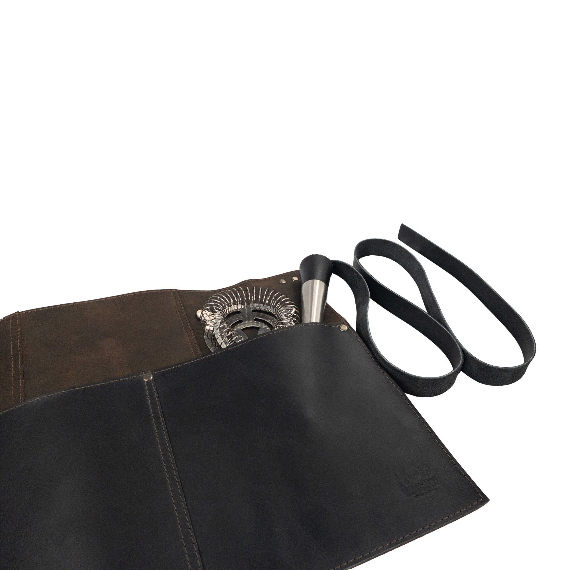 Detail of the Hide & Drink Barista Leather Waist Apron showing its practices with riveted pockets, crafted from sturdy full grain leather. Artisan-made in small batch production in La Antigua Guatemala & Oaxaca Mexico.
