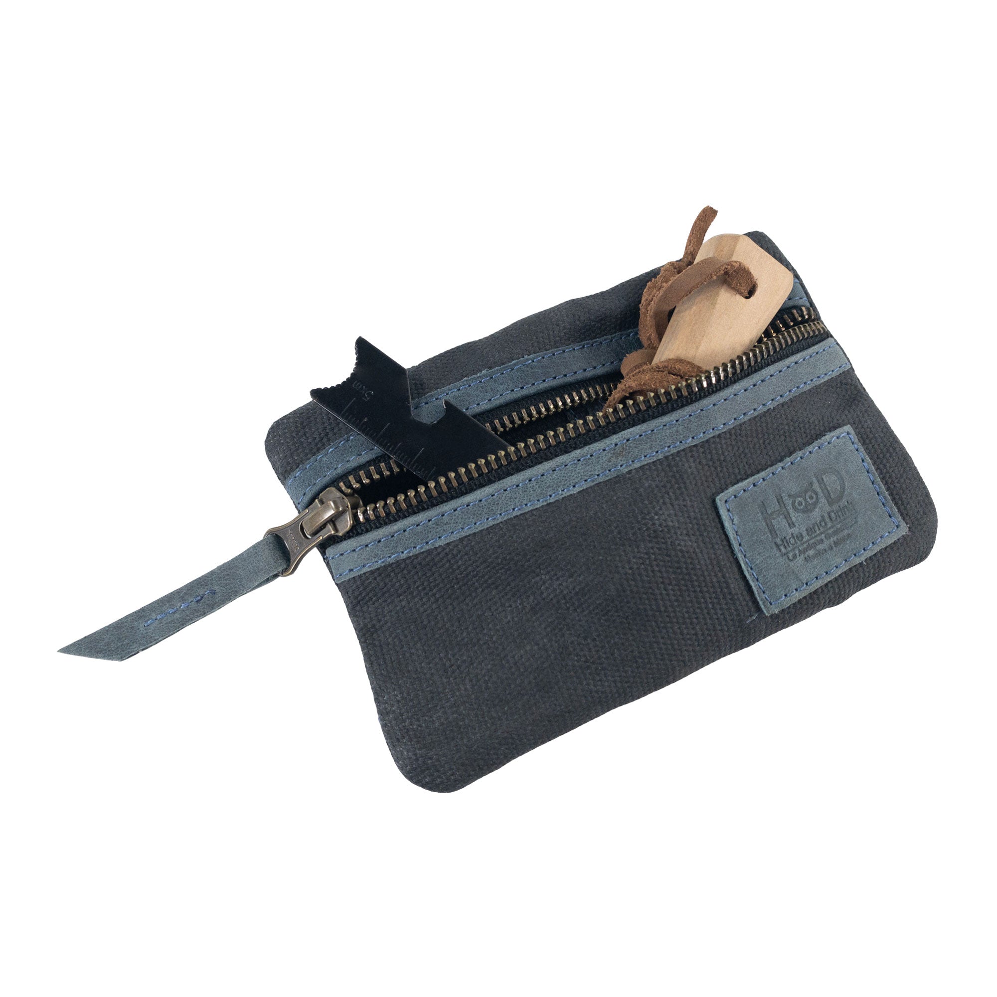 Open dark grey Multi-tool Pocket Pouch by Hide & Drink, displaying its well-structured internal pockets for organization.