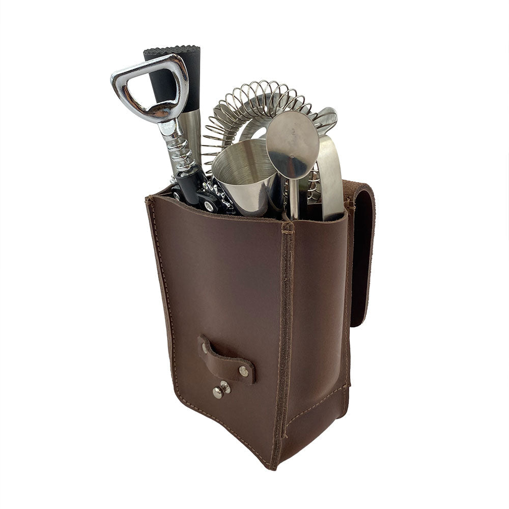 Bartender Fanny Pack by Hide & Drink filled with essential tools like a Bartender Bottle Opener and cocktail strainer. This handmade belt pouch combines practical use with quality craftsmanship in thick full grain leather. Artisan-made in La Antigua Guatemala.
