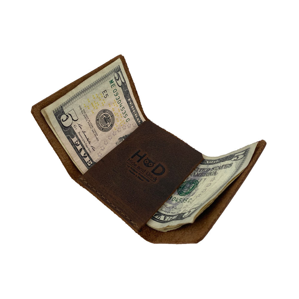 The Hide & Drink Minimalist Wallet Bills Only is open to reveal its storage capabilities, featuring quality Full Grain Leather. This Ultra Minimalist Wallet acts as a stylish cash organizer, showcasing handmade craftsmanship from La Antigua Guatemala and Oaxaca Mexico through its hand sewn details.