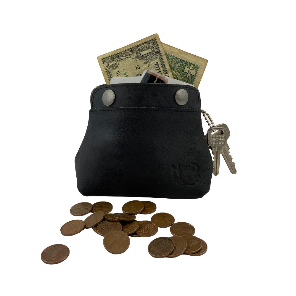 Hide & Drink Double Snap Pouch filled with money and keys, demonstrating its practicality as a cash holder and organizer. Artisan made from full grain leather in La Antigua Guatemala.