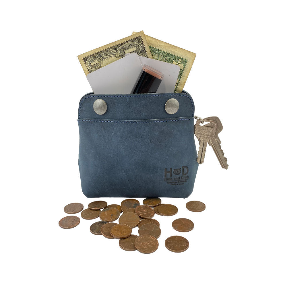 Hide & Drink Double Snap Pouch filled with cash and coins, illustrating its functionality as a cash organizer and coin purse. This handcrafted full grain leather item is a perfect everyday companion.