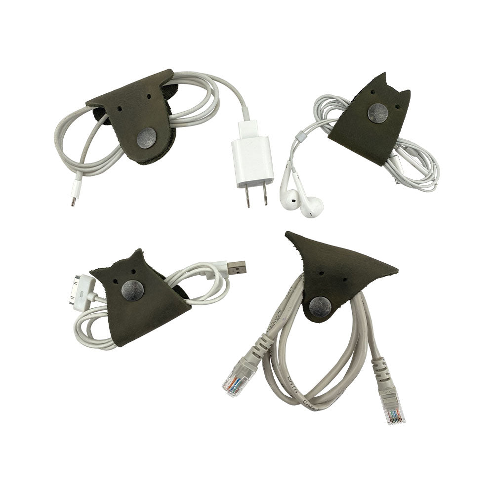 Furry Friends Cord Keeper (4-Pack), featuring lovely animal shapes, made of premium Full Grain Leather by Hide & Drink to keep your cables stylishly organized. Furry Friends 4-Pack Cord Keeper (Cord Clam), Full Grain Leather, StockyardX, Small Batch Production, Hand Cut, Hand Sewn, Fire Branded, Artisan, Handmade in La Antigua Guatemala & Oaxaca Mexico.