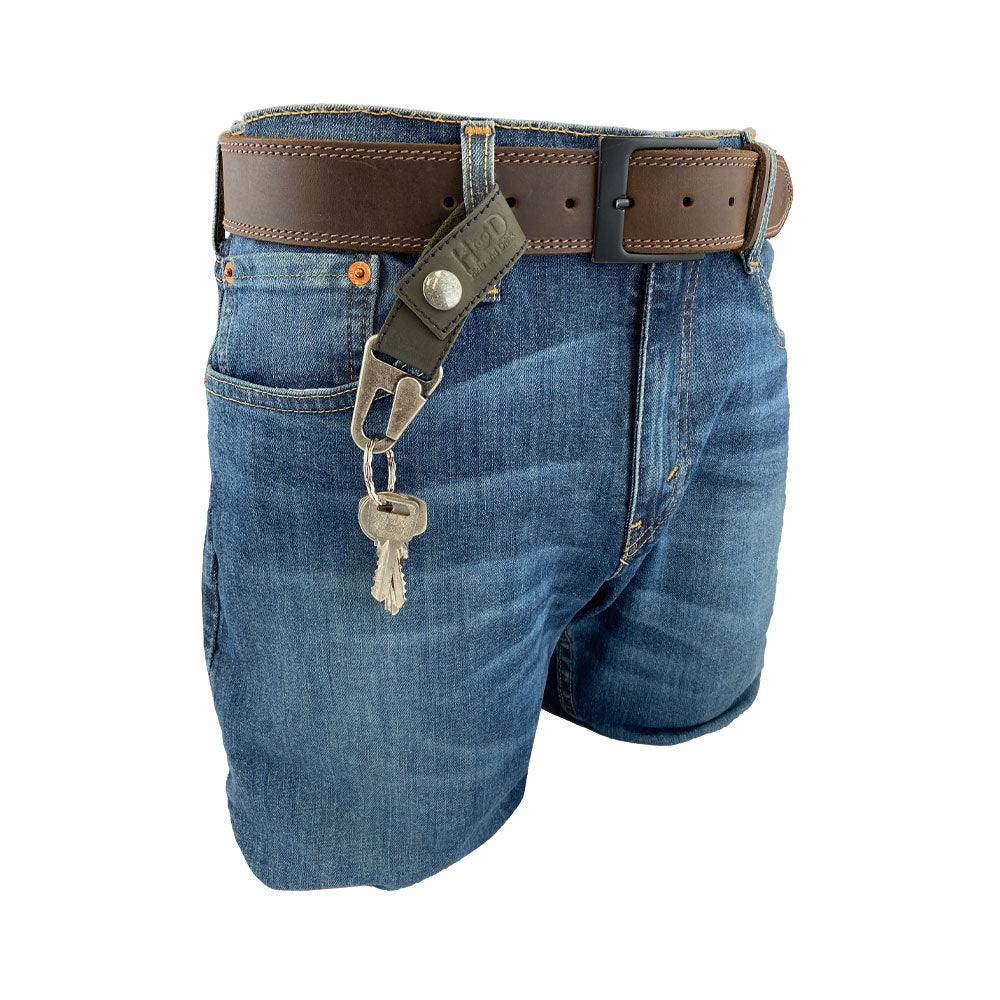 Key Ring Holder by Hide & Drink, elegantly clipped onto a belt loop, made from Full Grain Leather. This artisan piece represents StockyardX's commitment to small batch production and showcases hand-cut, hand-sewn features, with fire branding, all handcrafted in La Antigua Guatemala & Oaxaca Mexico.