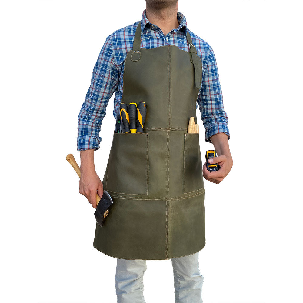 Hide & Drink Leather Apron on display with dimensions included, highlighting its spacious pockets and adjustable straps for convenient use, made with durable full grain leather.