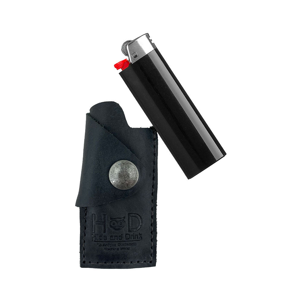 Compact design of the Hide & Drink Lighter Protective Case made from rich full grain leather, perfect for those who appreciate artisan quality. Handmade in La Antigua Guatemala & Oaxaca Mexico. Keywords: Lighter Protective Case, Full Grain Leather.
