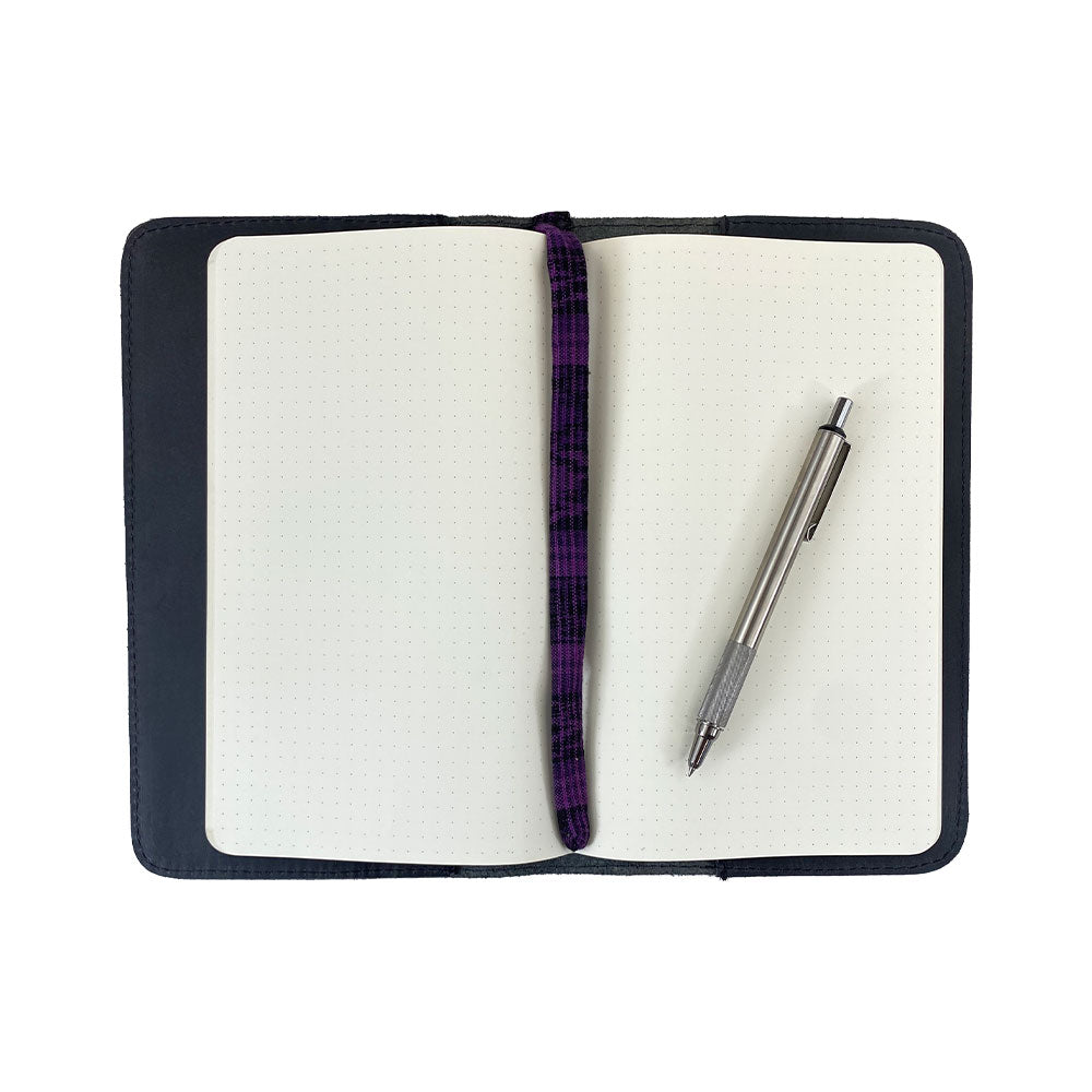 Front view of a tan Journal Cover for Moleskine Cahier L (5 x 8.25 in.) by Hide & Drink. Ideal for large size (5 x 8.25 in.) notebooks, this refillable journal cover showcases the beauty of full grain leather and artisan craftsmanship.