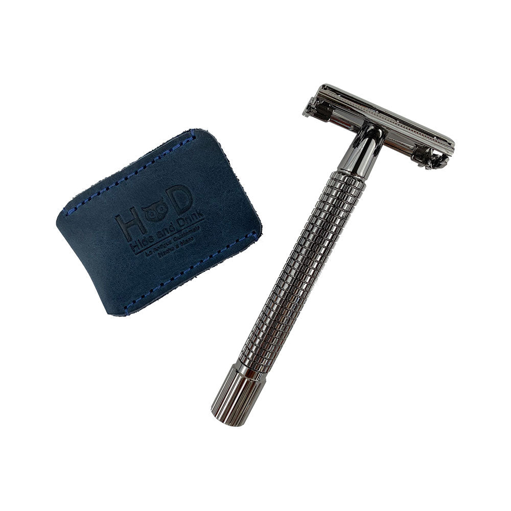 Razor Head Cover by Hide & Drink alongside a double edge safety razor, illustrating the compact and practical design of the full grain leather cover. This shaving travel cover is perfect for those who appreciate artisan craftsmanship and handmade quality from small batch production in La Antigua Guatemala and Oaxaca Mexico.