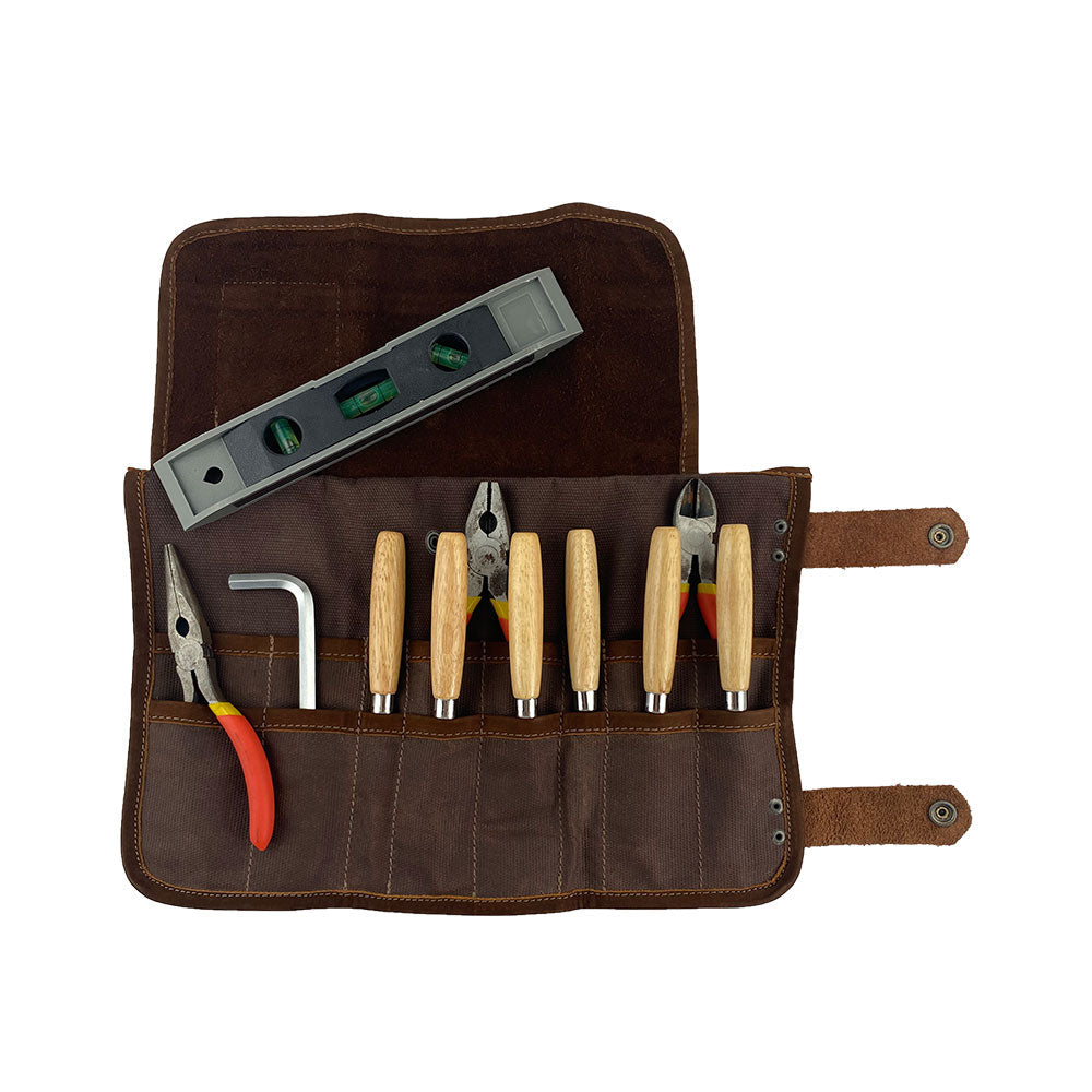 Hide & Drink's Barber Tool Roll features a Snap Tool Roll Up Bag with 14 Slots, designed for effective storage of scissors & screwdrivers. Made from durable Full Grain Leather, this portable carry case reflects StockyardX's small batch production ethos and artisan craftsmanship, hand cut, hand sewn, and fire branded in La Antigua Guatemala & Oaxaca Mexico.