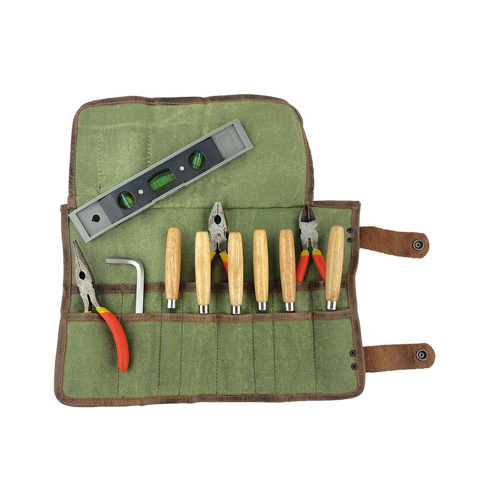 Overview of Hide & Drink's Barber Tool Roll, featuring a Snap Tool Roll Up Bag with 14 Slots for organizing scissors & screwdrivers. This portable carry case, crafted from Full Grain Leather, highlights StockyardX's commitment to small batch production and artisan craftsmanship, hand cut, hand sewn, and fire branded in La Antigua Guatemala & Oaxaca Mexico.