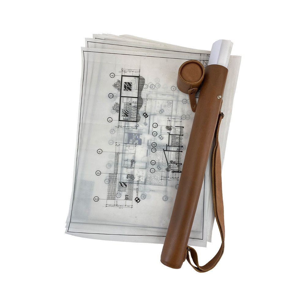 Close-up of Hide & Drink's Blueprint Tube (A2 Paper Size) showing the craftsmanship and logo. This full grain leather document storage tube features an adjustable strap, ideal for professionals on-the-go, showcasing the artisan spirit and small batch production of StockyardX in La Antigua Guatemala & Oaxaca Mexico.