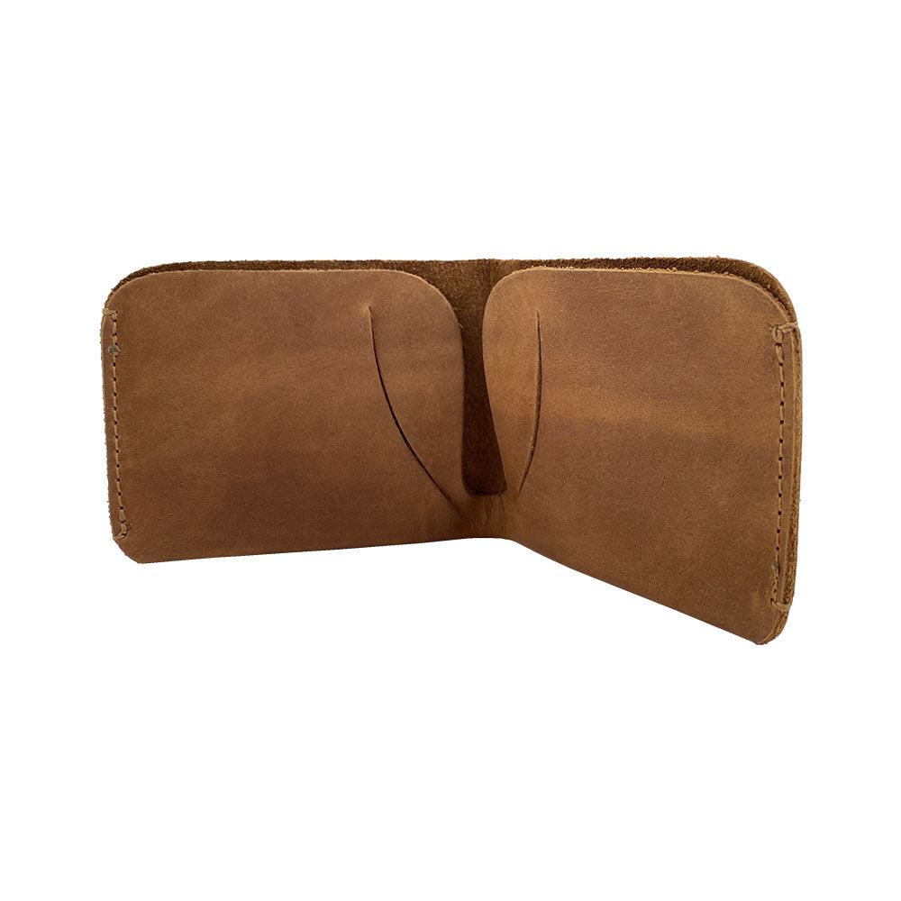 The Hide & Drink Minimal Wallet with elegant design features, crafted from quality Full Grain Leather. This Classic Slimfold Wallet acts as a Card Organizer Holder and essential Travel Accessory, showcasing unique Small Batch Production by artisans in La Antigua Guatemala & Oaxaca Mexico.