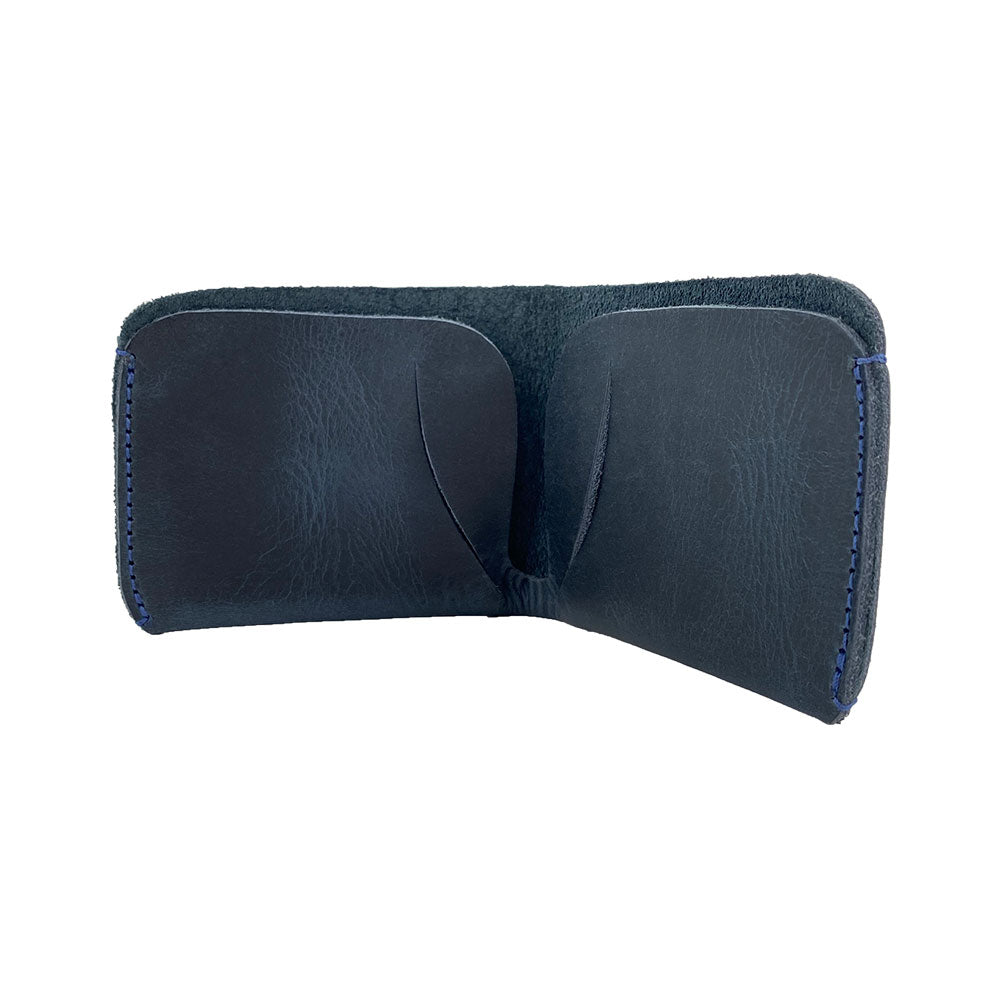 The Hide & Drink Minimal Wallet open to display cash and cards, made from premium Full Grain Leather. Ideal as a Classic Slimfold Wallet, it functions as a Card Organizer Holder and essential Travel Accessory, handcrafted with passion through Small Batch Production by artisans from La Antigua Guatemala & Oaxaca Mexico.