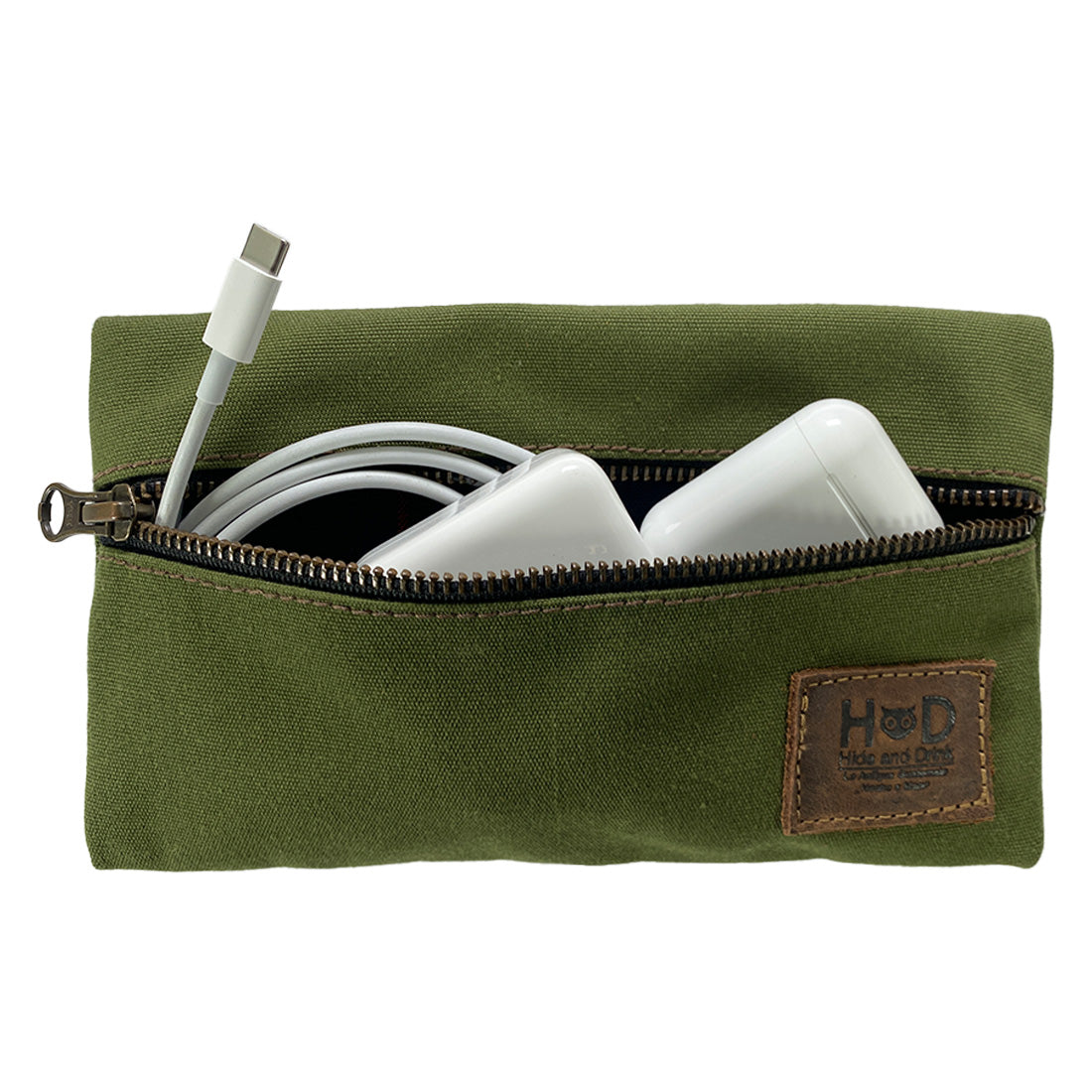 Hide & Drink Utility Cord Pouch presented in a warm tone, reflecting its artisanal roots. This pouch serves as an all-purpose utility & charger case for MacBook, iPad & Laptop and beautifully doubles as a cable organizer, handcrafted in La Antigua Guatemala & Oaxaca Mexico.