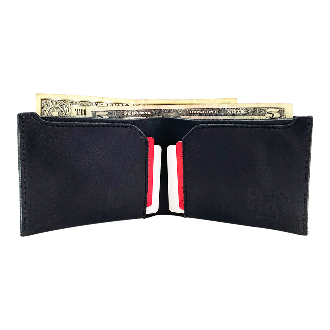 Measuring dimensions of the black Hide & Drink Classic Wallet, showcasing its perfect size for pockets and bags. Classic Wallet, Card Organizer, Money Holder, Vintage Pocket, Travel Accessories, Full Grain Leather, StockyardX, Small Batch Production, Hand Cut, Hand Sewn, Fire Branded, Artisan, Handmade in La Antigua Guatemala & Oaxaca Mexico.