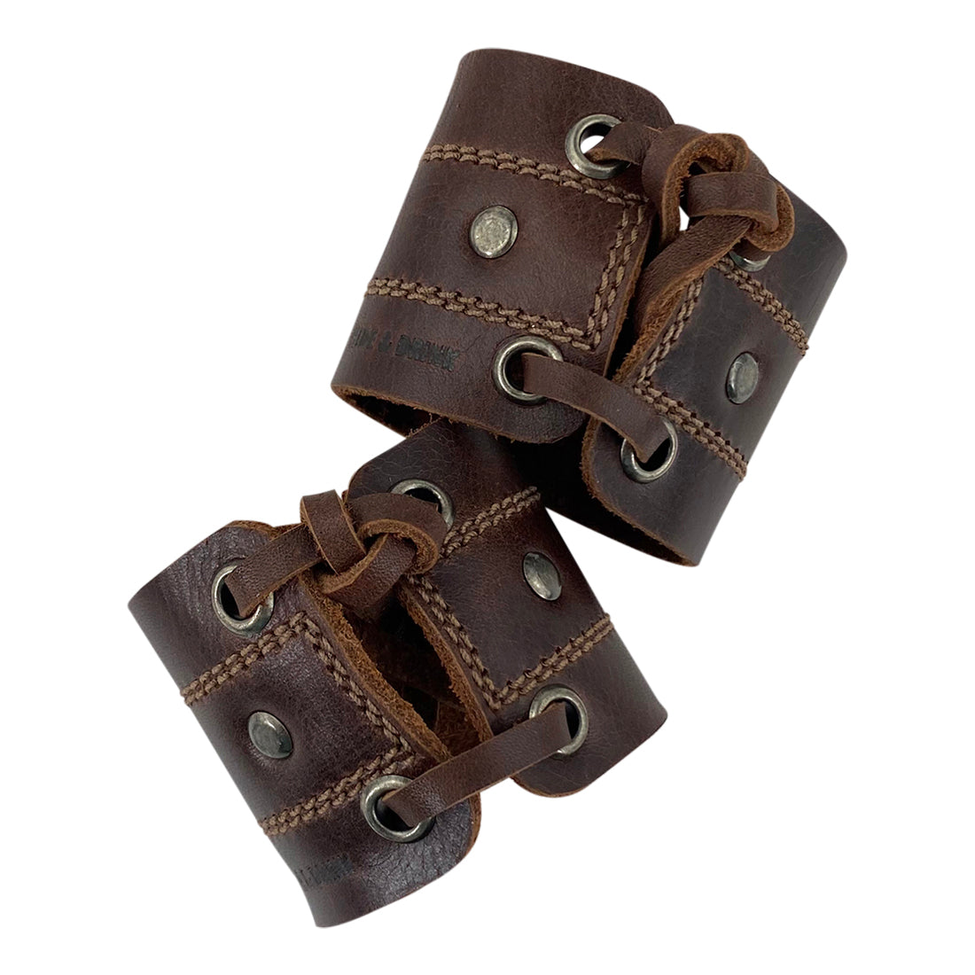 Another perspective of the Men's Wristband by Hide & Drink, emphasizing its sleek design and quality leather finish. This wristband makes a statement while also being incredibly durable for everyday wear. Men's Wristband Handmade, Full Grain Leather, StockyardX, Small Batch Production, Hand Cut, Hand Sewn, Fire Branded, Artisan, Handmade in La Antigua Guatemala & Oaxaca Mexico.