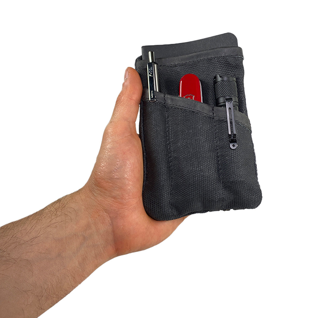Open Multi-tool Pocket Pouch in black by Hide & Drink, displaying its organized compartments for tools, a great option for those who need compact storage.