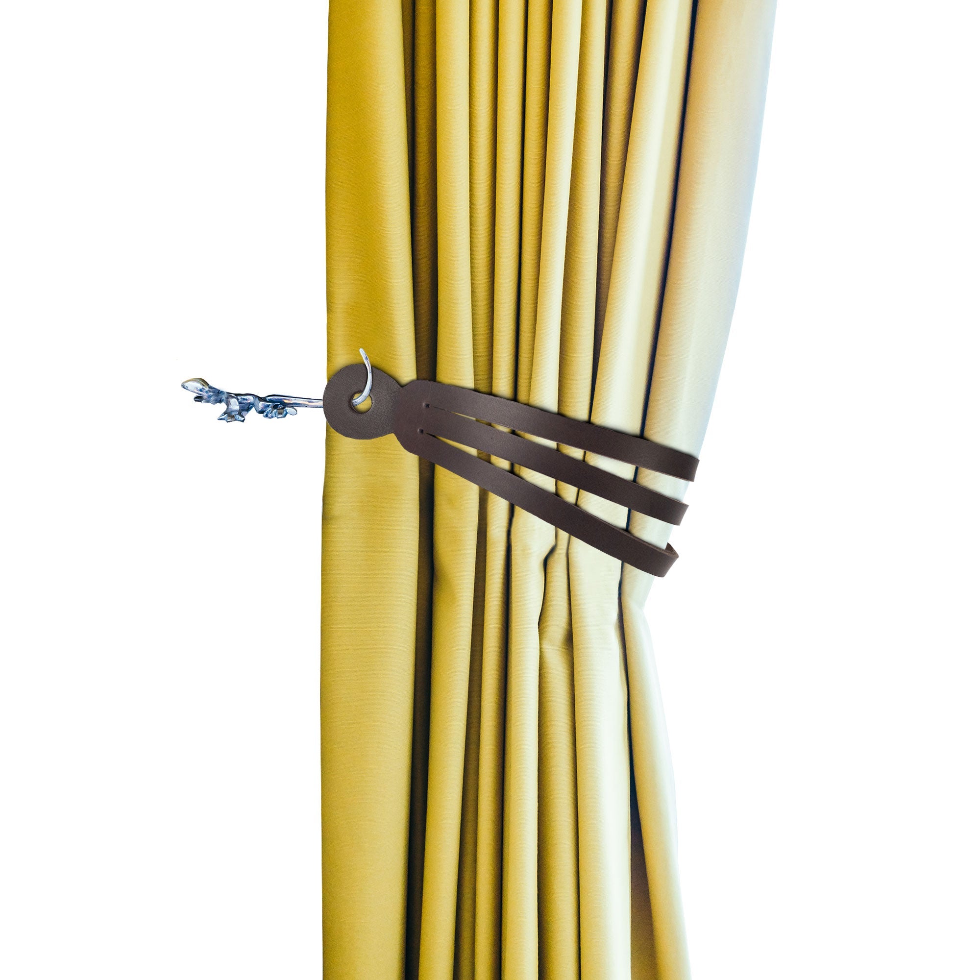 Curtain Tie Back (2 Pack) elegantly holding curtains, made from thick full grain leather and designed by Leather At Home. These handmade items reflect artisan skills, highlighting the craftsmanship from La Antigua Guatemala & Oaxaca Mexico.