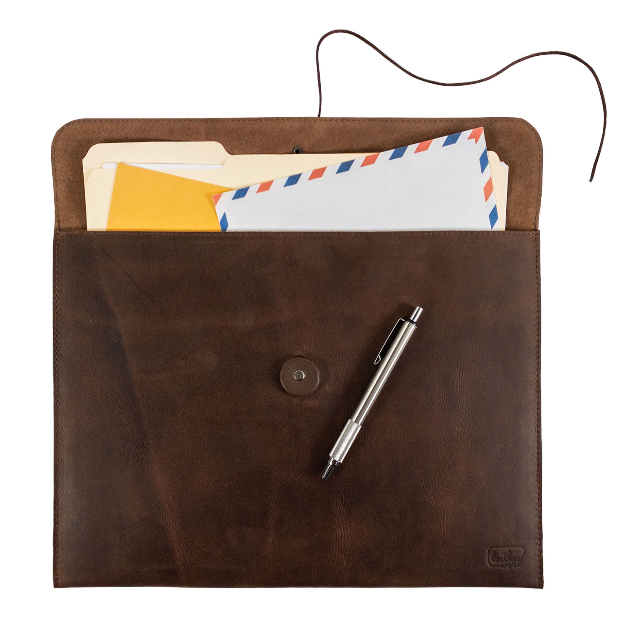 Interior view of the Horizontal Mailing Envelope by Leather Worx, revealing its spacious design for secure storage of documents; made from premium Full Grain Leather and showcasing artisan details like hand cut and hand sewn finishes, made with care in La Antigua Guatemala & Oaxaca Mexico.