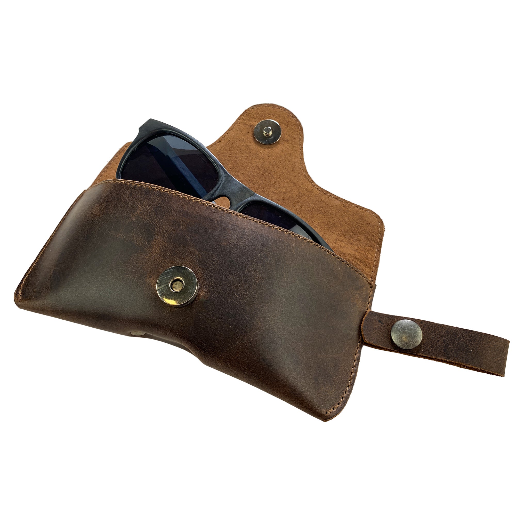 Eyeglasses Case with Strap featuring sunglasses inside, beautifully crafted by Hide & Drink from high-quality full grain leather. This eyewear protector is an artisan piece, showcasing the skill of handmade production in La Antigua Guatemala & Oaxaca Mexico.