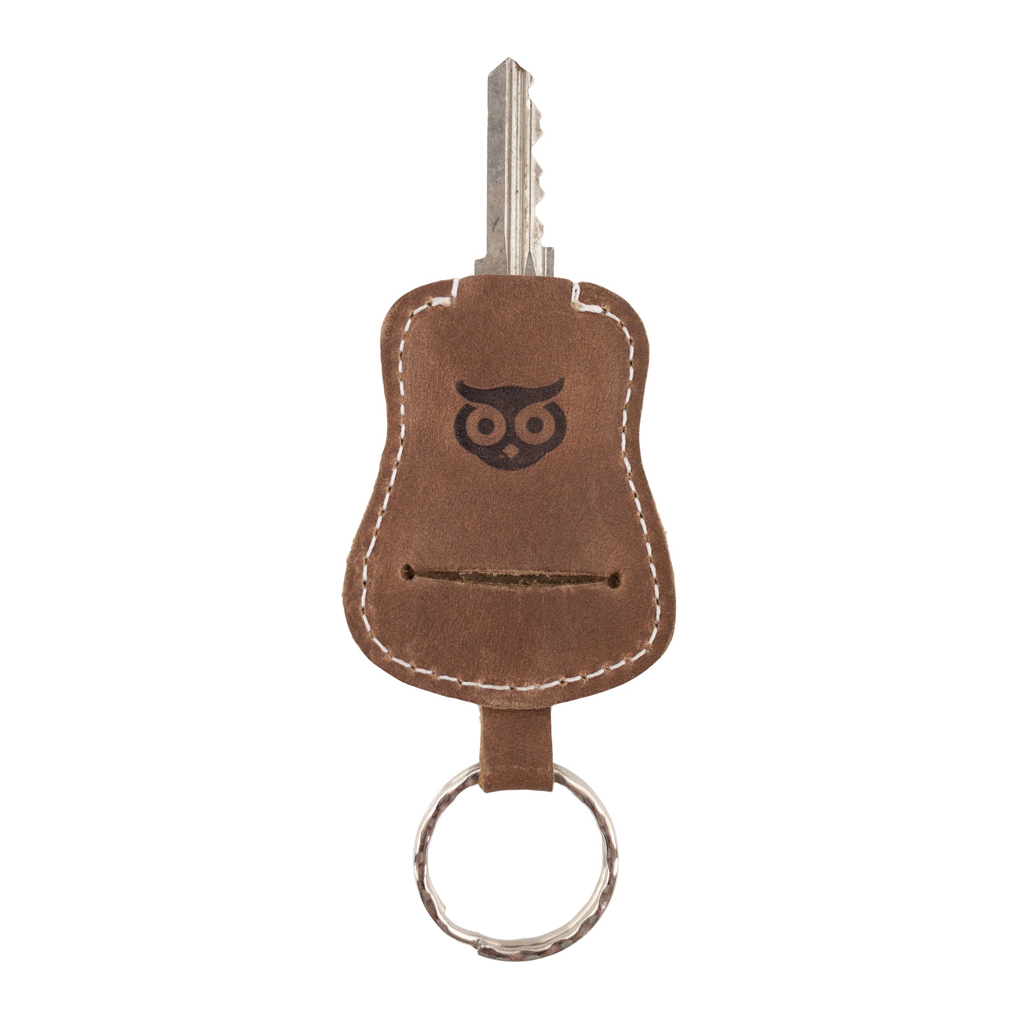 Stylish Guitar Keychain by Hide & Drink displayed elegantly, focusing on its design and craftsmanship. This key holder made from Full Grain Leather highlights artisan workmanship and small batch production from La Antigua Guatemala & Oaxaca Mexico.