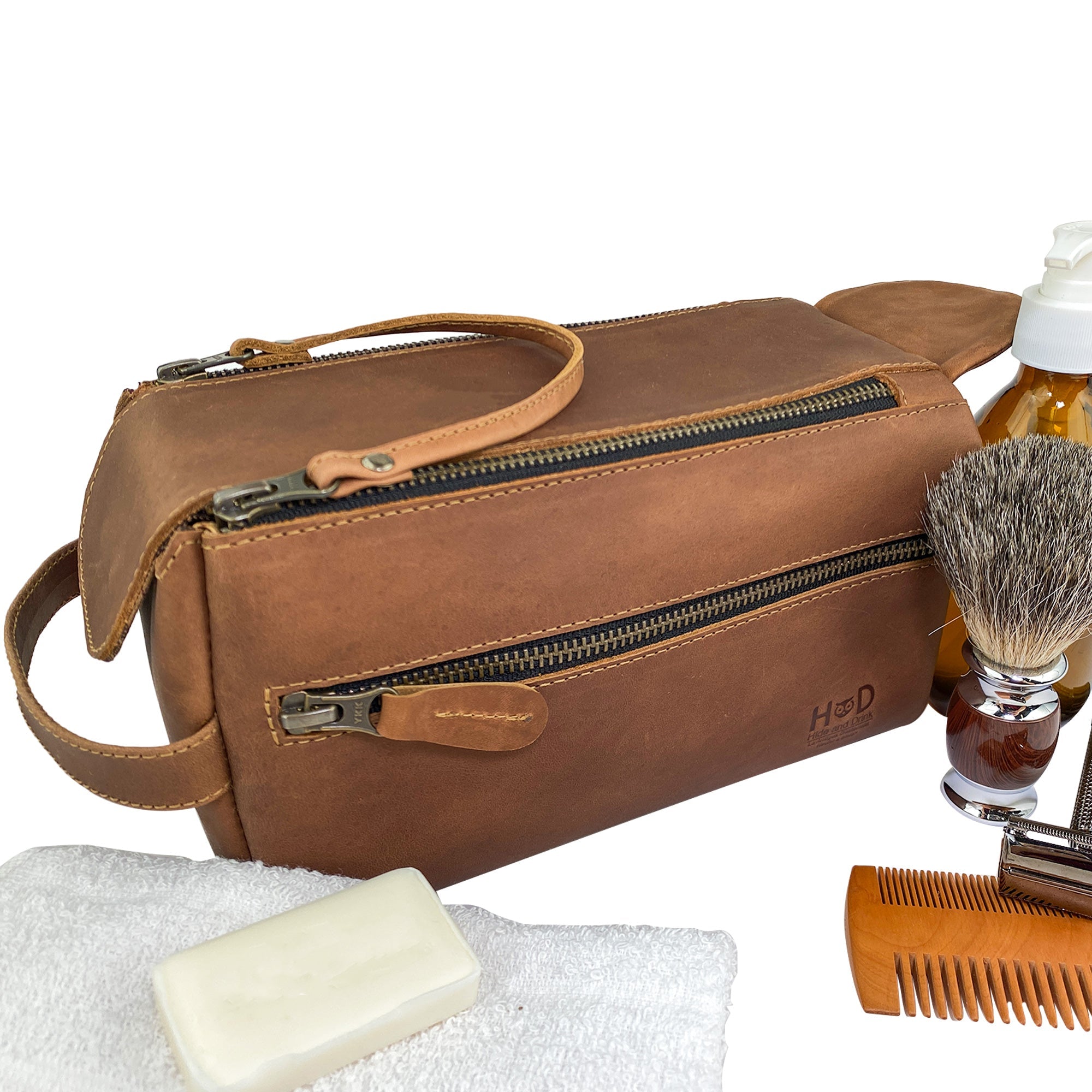Hide & Drink's Toiletry Bag shown containing grooming essentials, showcasing its utility. This Full Grain Leather Toiletry Bag is an ideal Hand Bag or Dopp Kit Organizer for any occasion. StockyardX, Handmade, S.