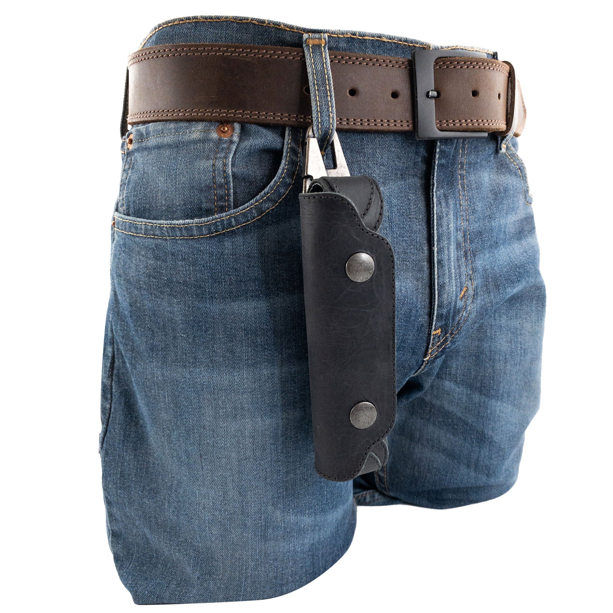 Harmonica Case on a belt, illustrating its practicality for musicians on the go. Crafted from full grain leather, this Hide & Drink accessory reflects artisan skills and vintage style, making it an essential musician's item from La Antigua Guatemala.