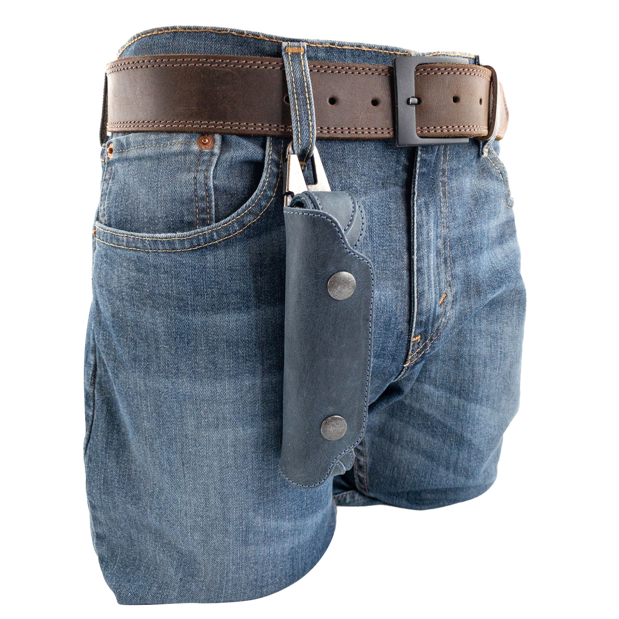 Harmonica Case from Hide & Drink attached to a belt, illustrating a hands-free solution for musicians. Made of durable full grain leather, this stylish accessory embodies artisan quality and practicality, handmade in La Antigua Guatemala.