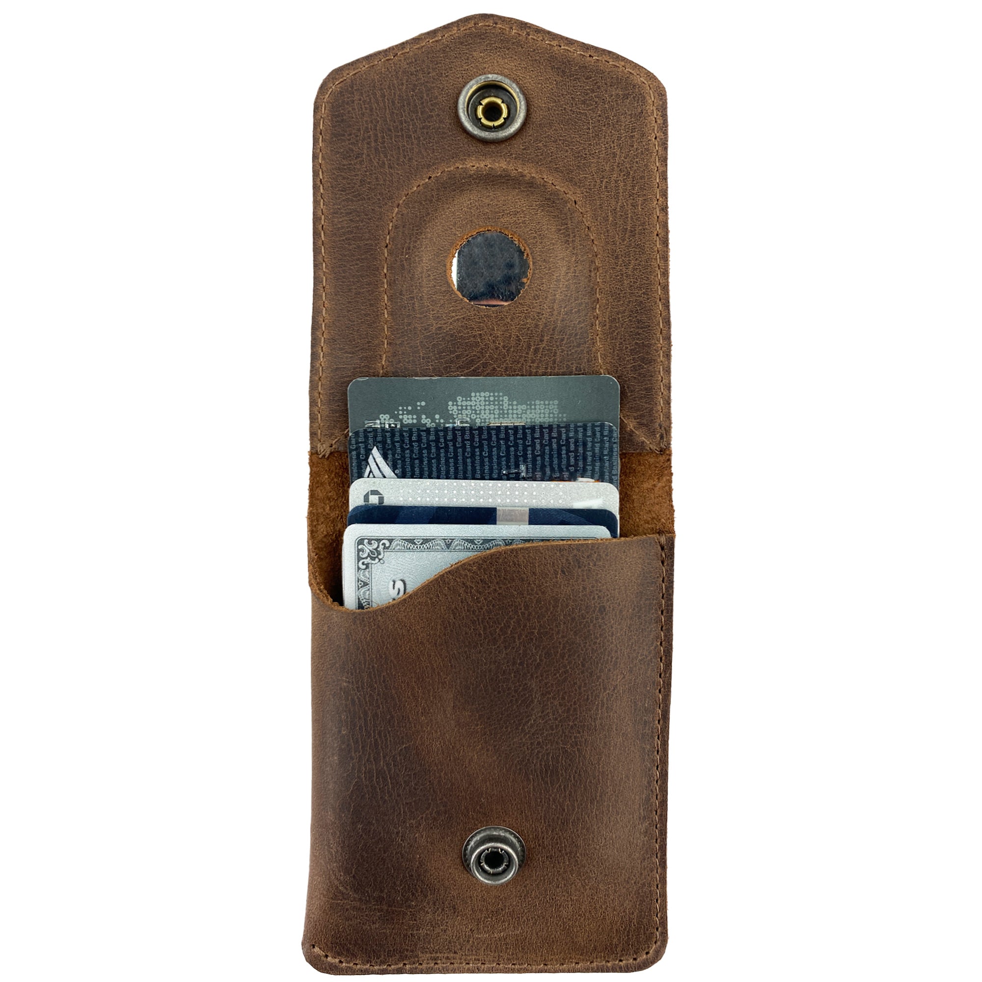 Interior view of the Card Holder with AirTag Slot by LeatherTex, showcasing stored cards. This compact pocket organizer is crafted from full grain leather, making it a reliable storage case for cash. Handmade in La Antigua Guatemala, this artisan piece is a premium travel accessory that merges fashion and function.