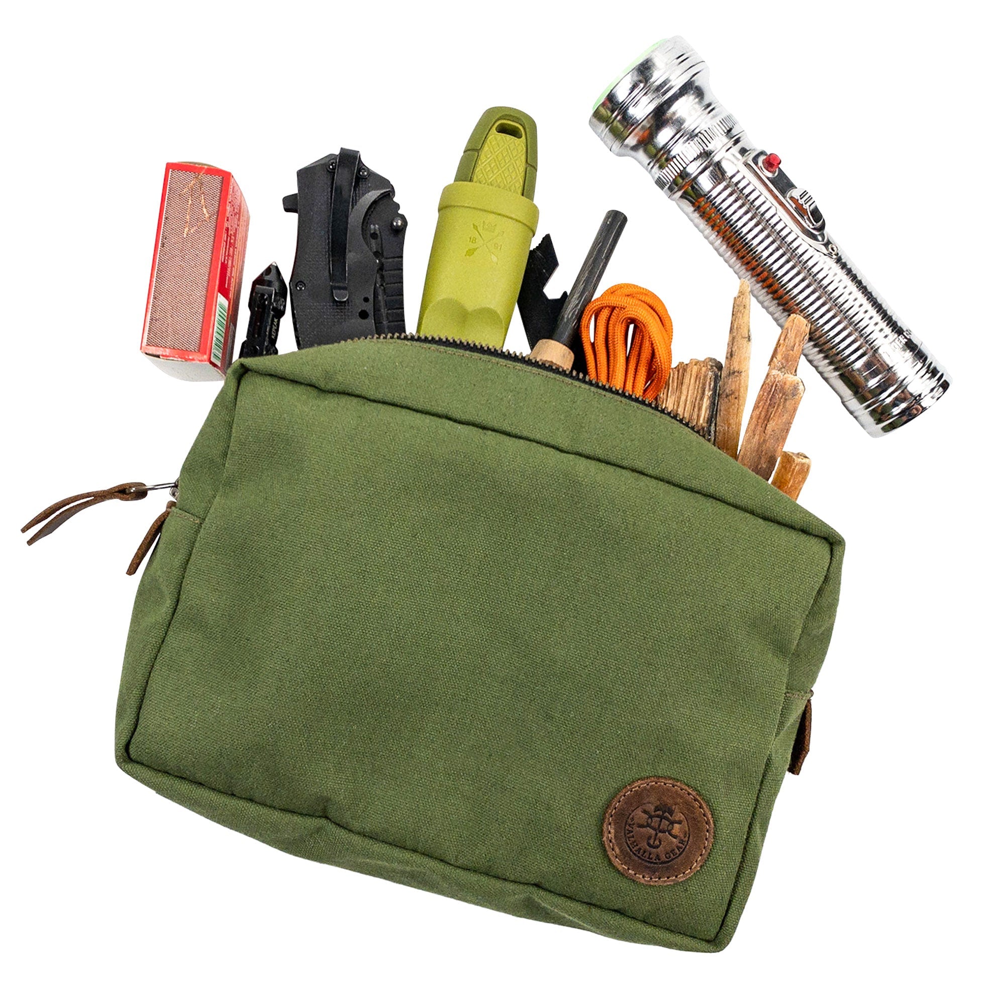 Open view of the Rectangular Utility Bag for Camping from Valhalla Gear, filled with essential gear, showcasing its spacious interior, handcrafted from water-resistant canvas and full grain leather in La Antigua Guatemala.