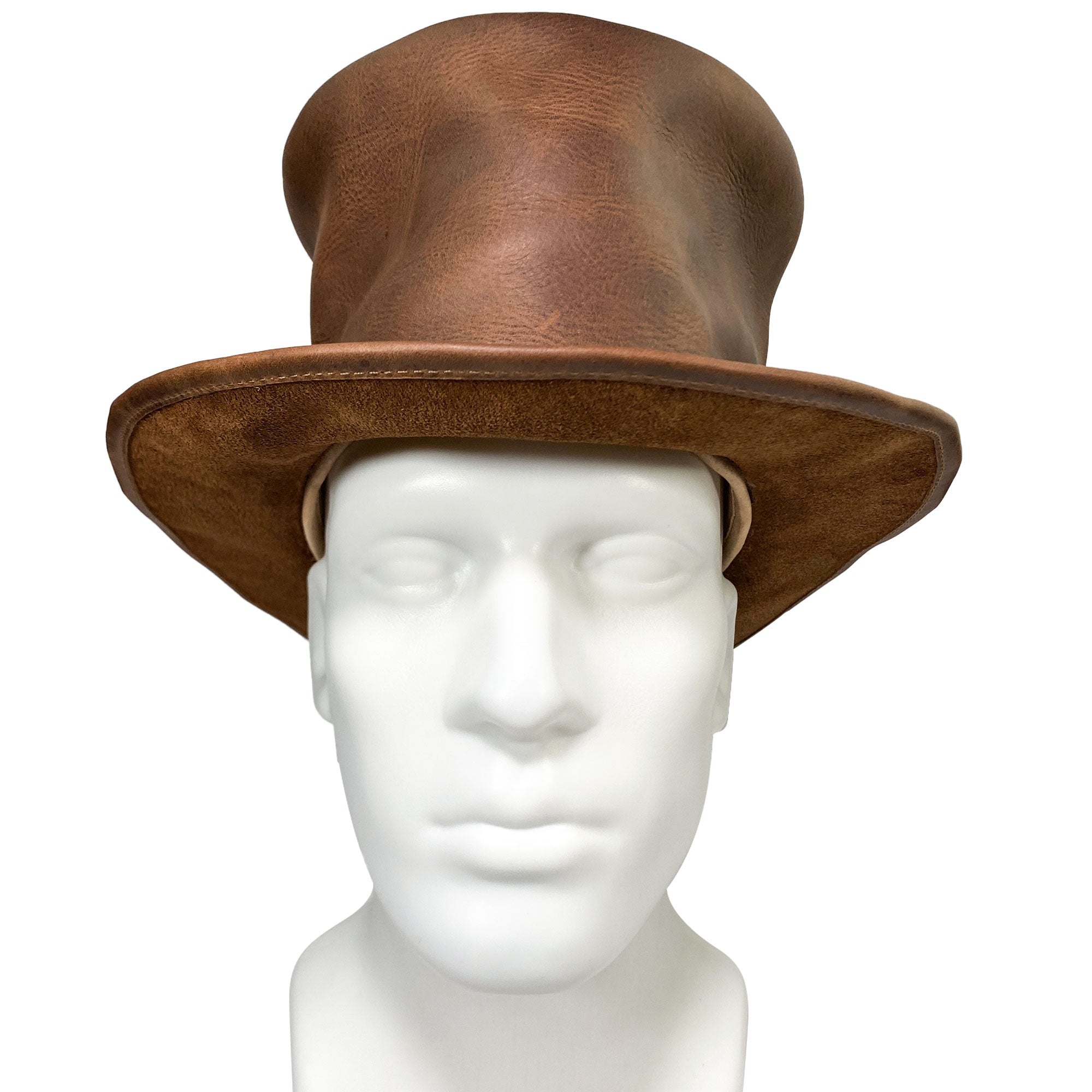 A front-facing view of the Hide & Play Top Hat being modeled, showcasing its elegant height and shape. This Top Hat is designed for those who love the Mad Hatter style, making it ideal for cosplay, Halloween, performances, films, and shows. Crafted from full grain leather, the hat embodies small batch production, hand cut, hand sewn technique, and fire branding from artisans in La Antigua Guatemala and Oaxaca Mexico.