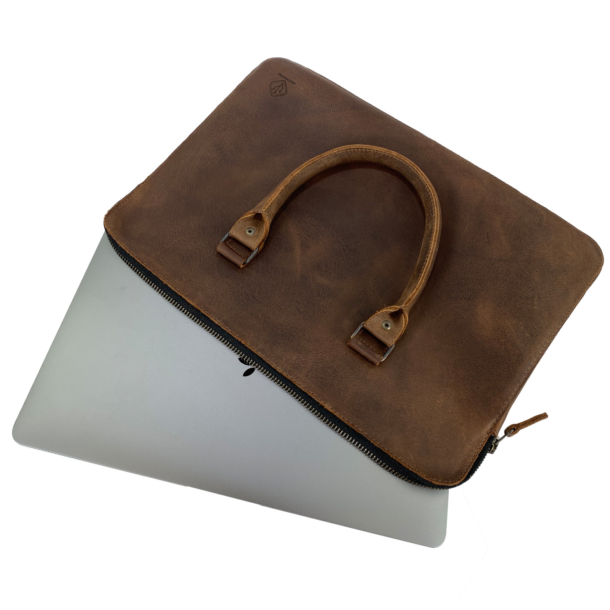 Top view of the LeatherTex 13" Laptop Portfolio Case placed over a MacBook, demonstrating its fit and functionality. Designed for MacBook Air/Pro 13 Inch with M1 Chip, this full grain leather case is handmade in La Antigua Guatemala and Oaxaca Mexico, reflecting artisan craftsmanship.