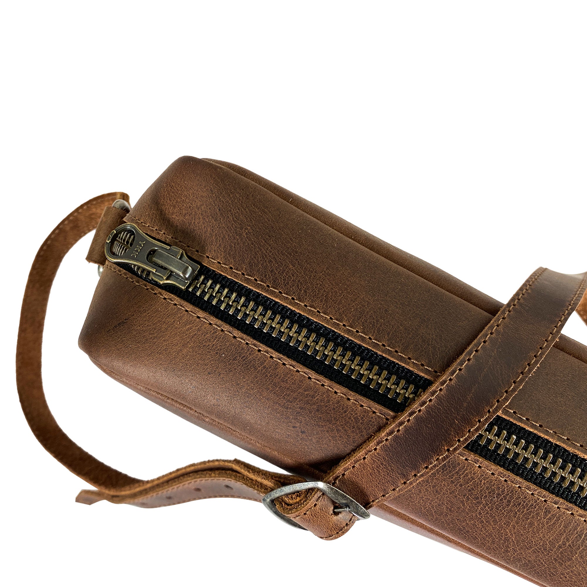Top view of Heather's Rectangular Crossbody Bag emphasizing its durable zipper closure, ideal for anyone seeking a stylish and functional bag for daily activities or travel. Squared Crossbody Bag - Stylish Shoulder Bag for Everyday Use or Travel, Full Grain Leather, StockyardX, Small Batch Production, Hand Cut, Hand Sewn, Fire Branded, Artisan, Handmade in La Antigua Guatemala & Oaxaca Mexico.