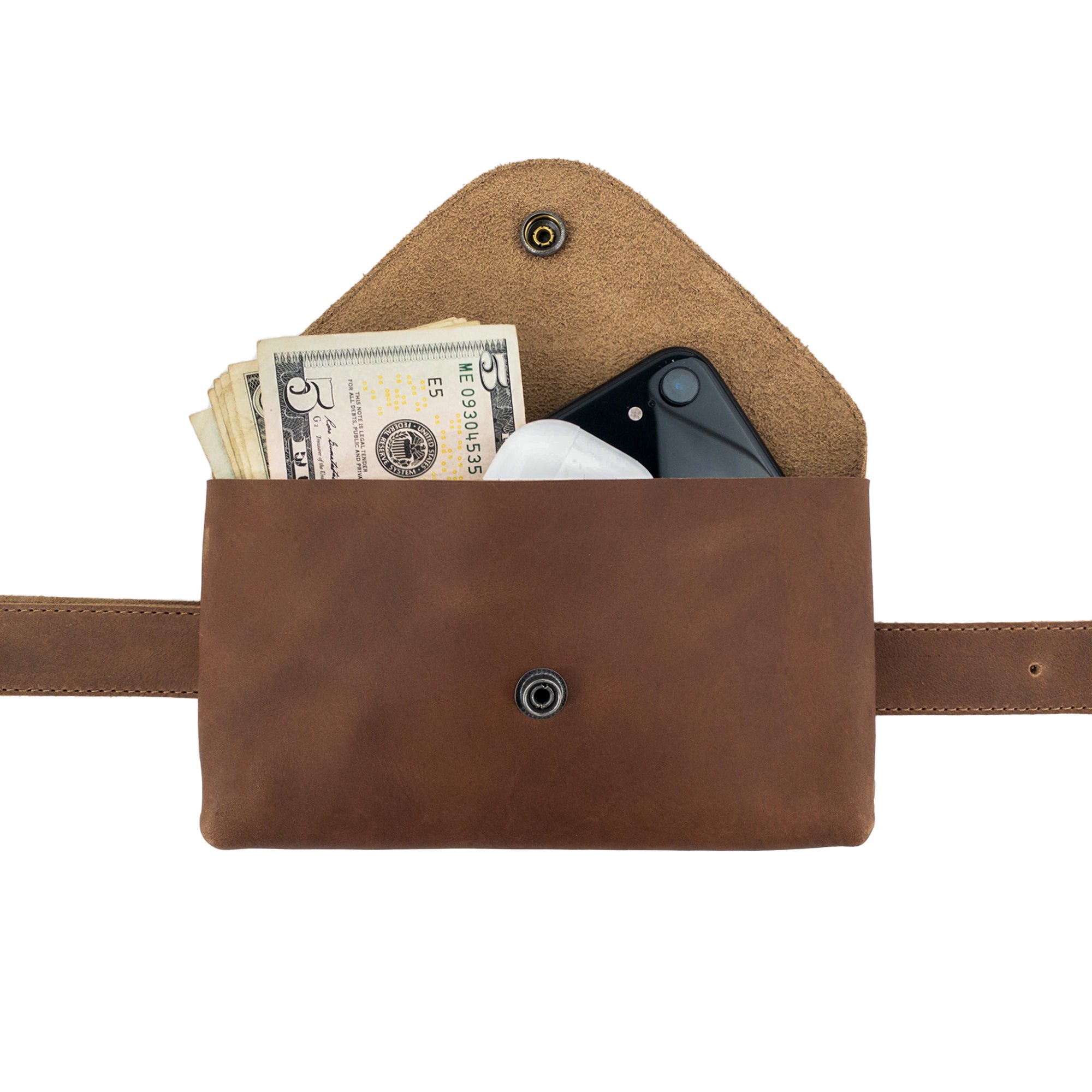 Cash and smartphone stored inside Hide & Drink's Fancy Fanny Pack, highlighting its utility and modern design. Made from full grain leather, this artisan-made fanny pack is perfect as a phone holder, showcasing craftsmanship from La Antigua Guatemala.