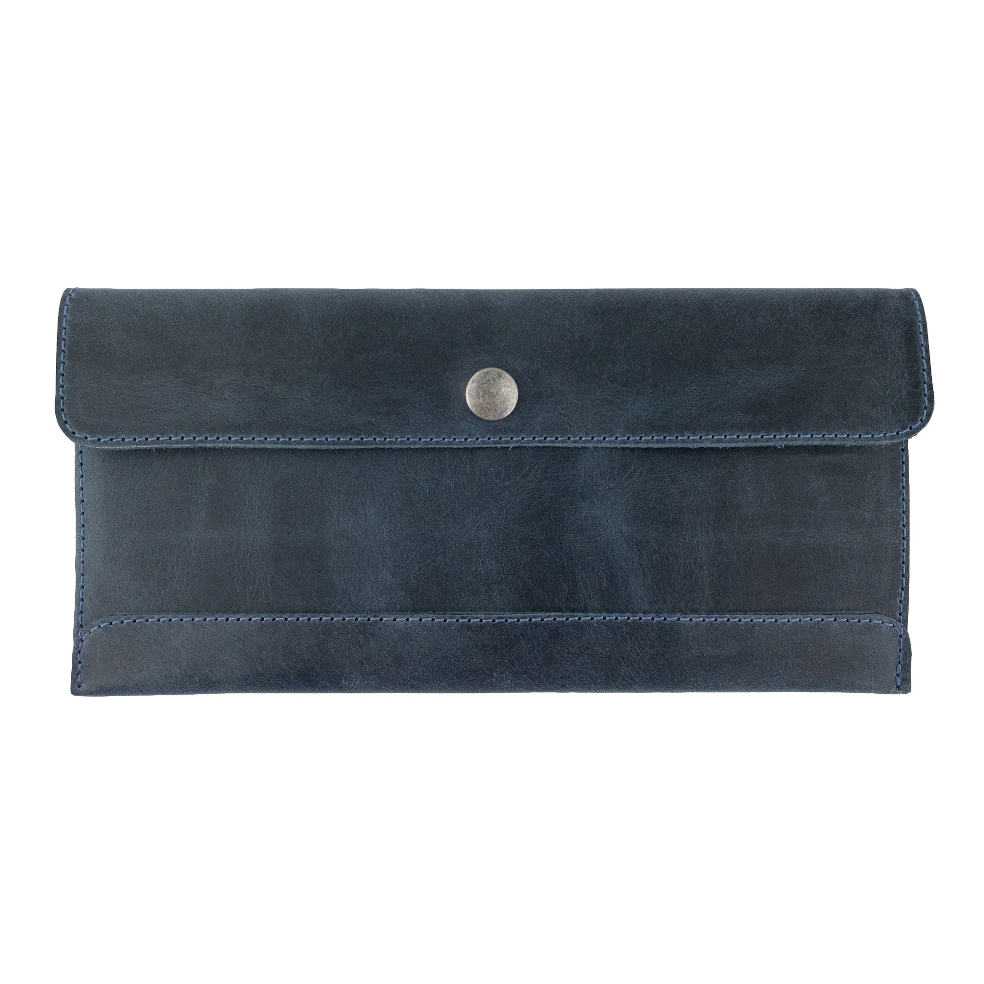 Hide & Drink's navy blue Travel Hand Wallet filled with cash and cards, demonstrating its practicality and style in Full Grain Leather. This Travel Wallet is handmade with love in La Antigua Guatemala & Oaxaca Mexico.