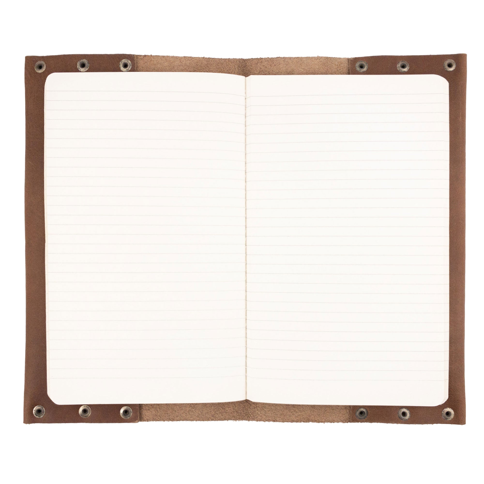 Interior view of the Riveted Journal Cover (5 x 8.50 in.) by Hide & Drink featuring lined pages. This full grain leather journal cover represents classic vintage style hand crafted by skilled artisans from La Antigua Guatemala & Oaxaca Mexico, designed for an optimal writing experience.