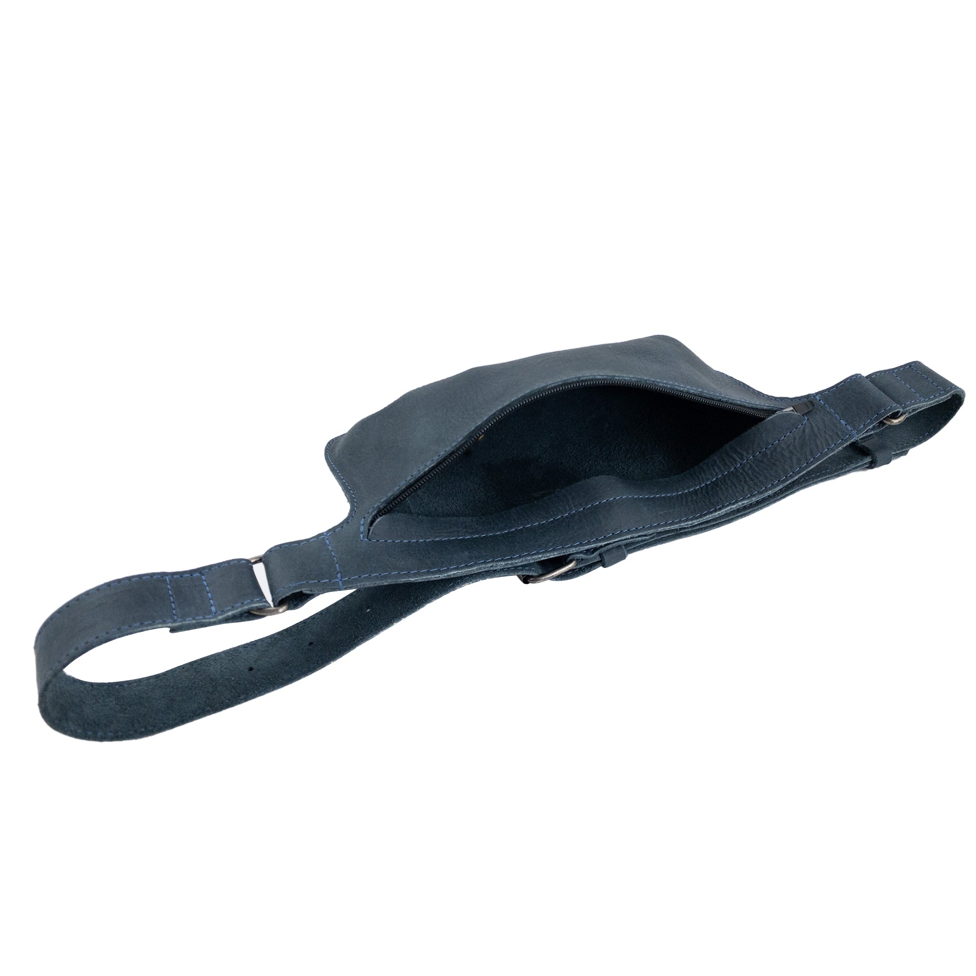 Slim Fanny Pack by Hide & Drink with a clear view of its interior, designed in a rectangular shape perfect for carrying essentials. This artisan piece is made from full grain leather, showcasing high-quality workmanship from La Antigua Guatemala.