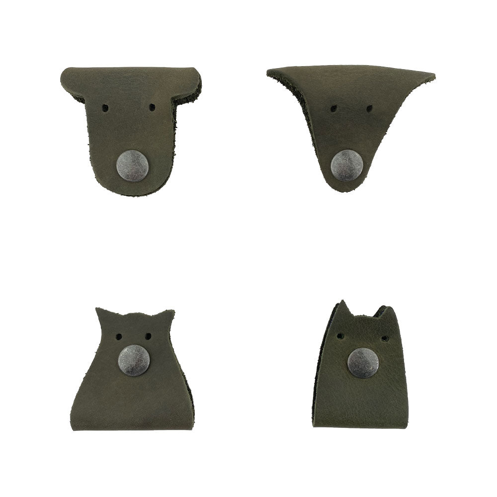 Furry Friends Cord Keeper (4-Pack) with adorable animal designs, crafted from Full Grain Leather by Hide & Drink, ideal for keeping cords tidy and organized. Furry Friends 4-Pack Cord Keeper (Cord Clam), Full Grain Leather, StockyardX, Small Batch Production, Hand Cut, Hand Sewn, Fire Branded, Artisan, Handmade in La Antigua Guatemala & Oaxaca Mexico.