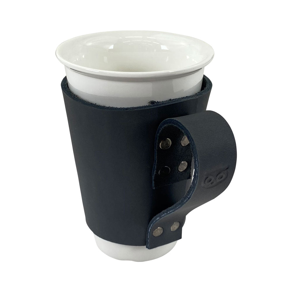 Stylish Pint Sleeve with Handle by Hide & Drink, ideal for enhancing your bar or pub experience. Crafted from high-quality Full Grain Leather with Hand Cut and Fire Branded features, it reflects artisan craftsmanship from La Antigua Guatemala & Oaxaca Mexico.