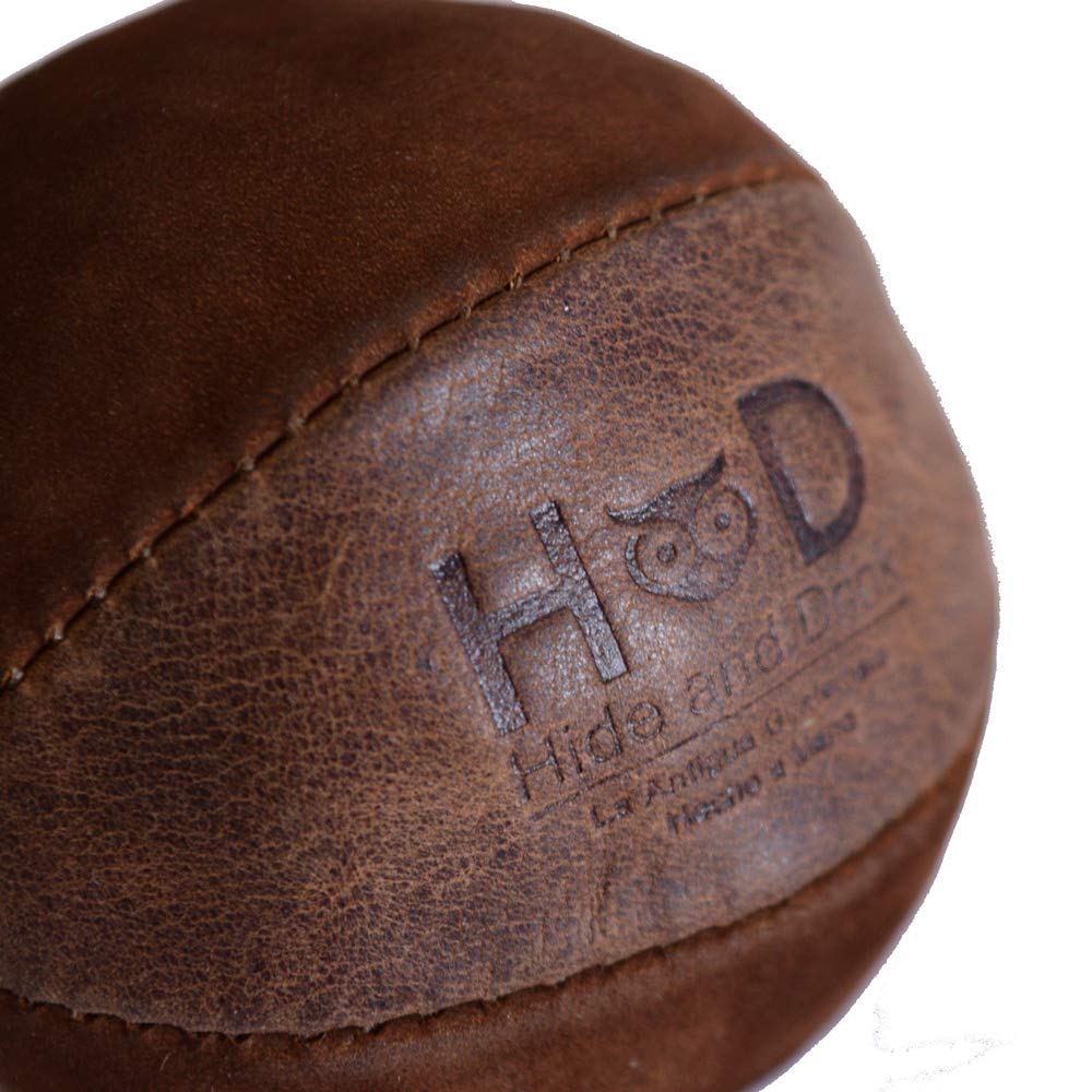Close-up of Hide & Drink Leather Juggling Balls (3-Pack) emphasizing the Full Grain Leather texture. Full Grain Leather Juggling Balls Set of 3 crafted with Small Batch Production practices, Hand Cut, Hand Sewn, and Fire Branded by expert Artisans. Handmade in La Antigua Guatemala & Oaxaca Mexico.