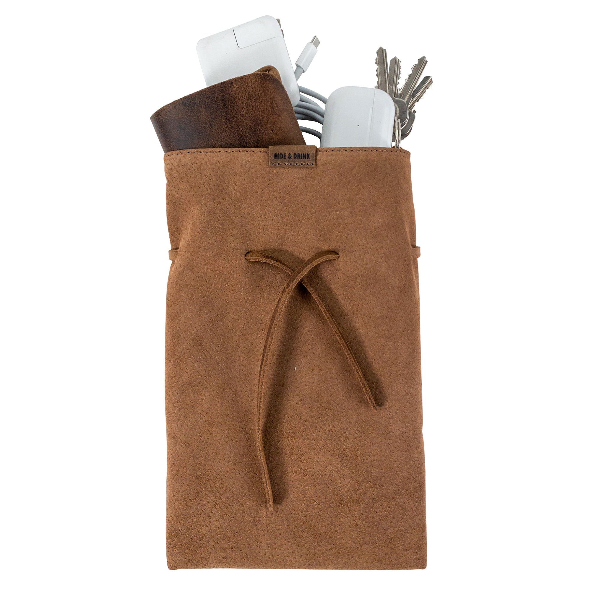 Hide & Drink's Drawstring Sack (2 pack) featuring a view highlighting the leathers' luxurious color and texture. Drawstring Sack (2 pack) Handmade from Sheepskin and Full Grain Leather, StockyardX, Small Batch Production, Hand Cut, Hand Sewn, Fire Branded, Artisan, Handmade in La Antigua Guatemala & Oaxaca Mexico.