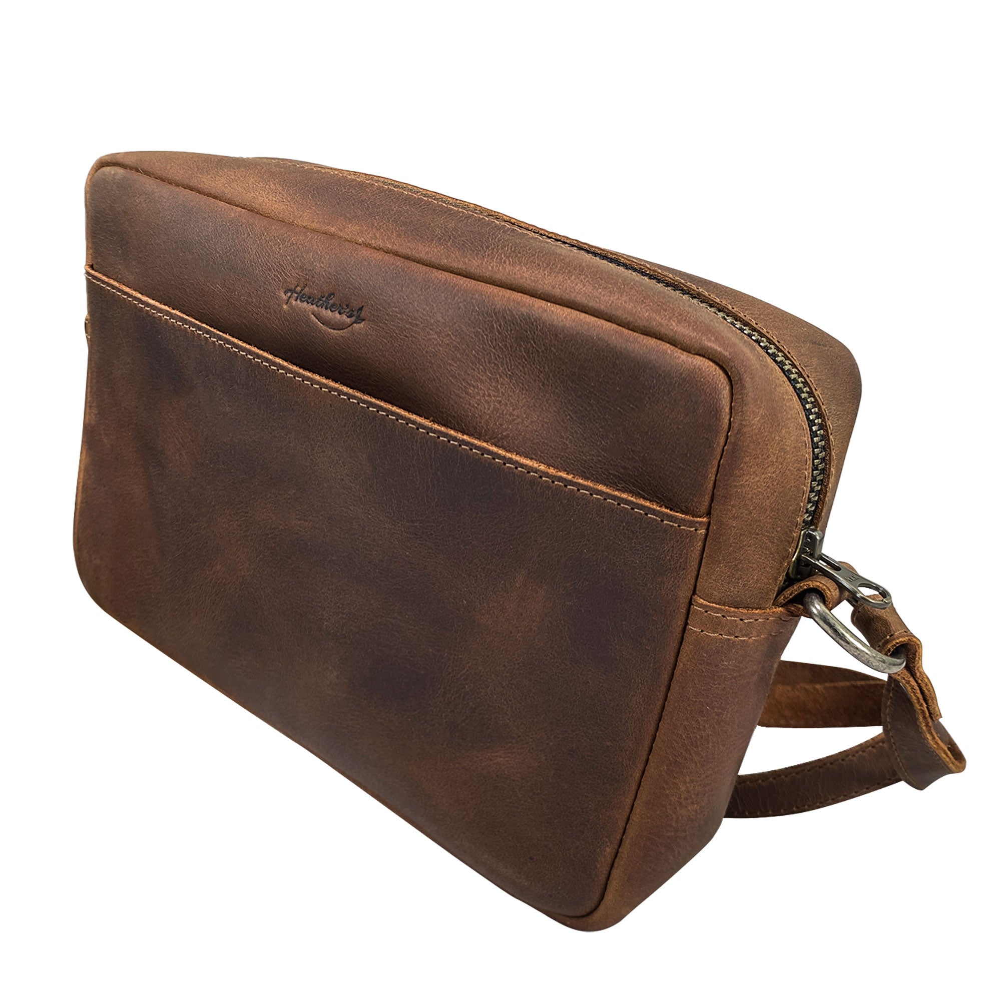 Side view of the open Heather's Rectangular Crossbody Bag, revealing its spacious interior, great for daily essentials or travel items. Squared Crossbody Bag - Stylish Shoulder Bag for Everyday Use or Travel, Full Grain Leather, StockyardX, Small Batch Production, Hand Cut, Hand Sewn, Fire Branded, Artisan, Handmade in La Antigua Guatemala & Oaxaca Mexico.