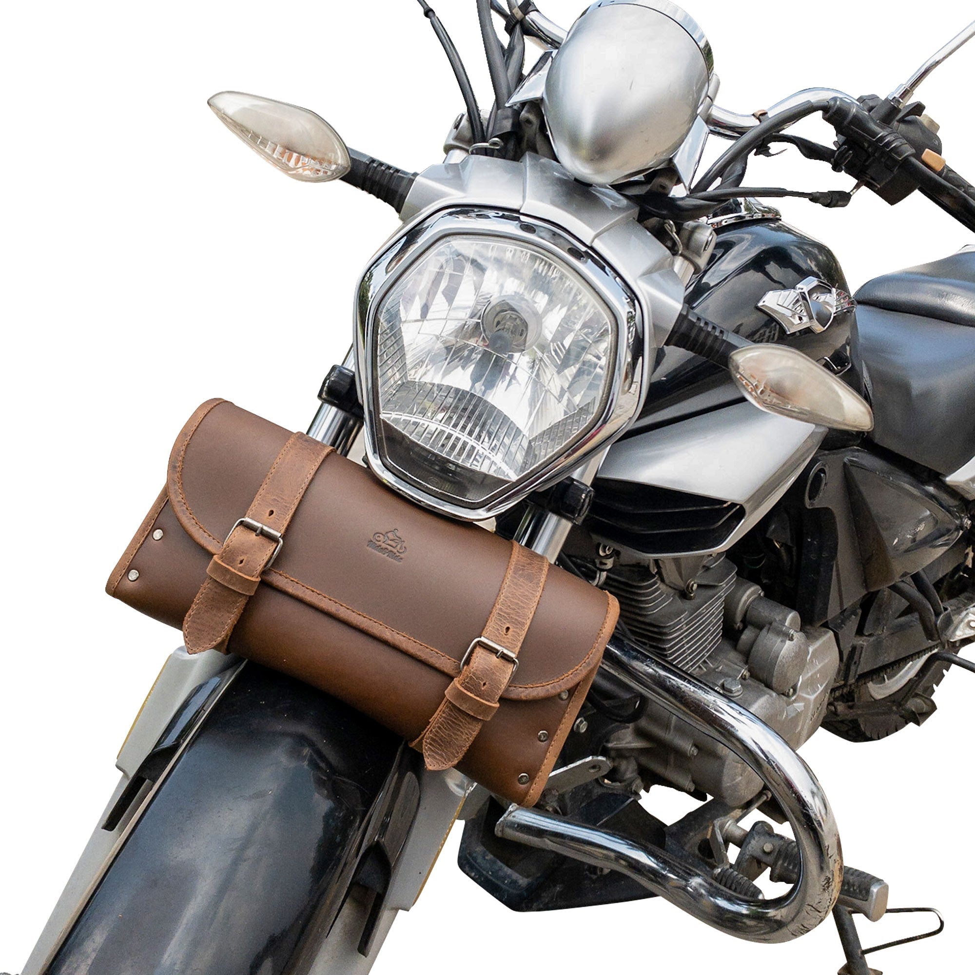 Riveted Bag for Motorcycle by Hide & Ride mounted on a motorcycle, showcasing its sleek design and practicality. This Motorcycle Riveted Bag is an amazing biker accessory, made of full grain leather and reflects the dedication to small batch artisan production in La Antigua Guatemala & Oaxaca Mexico.