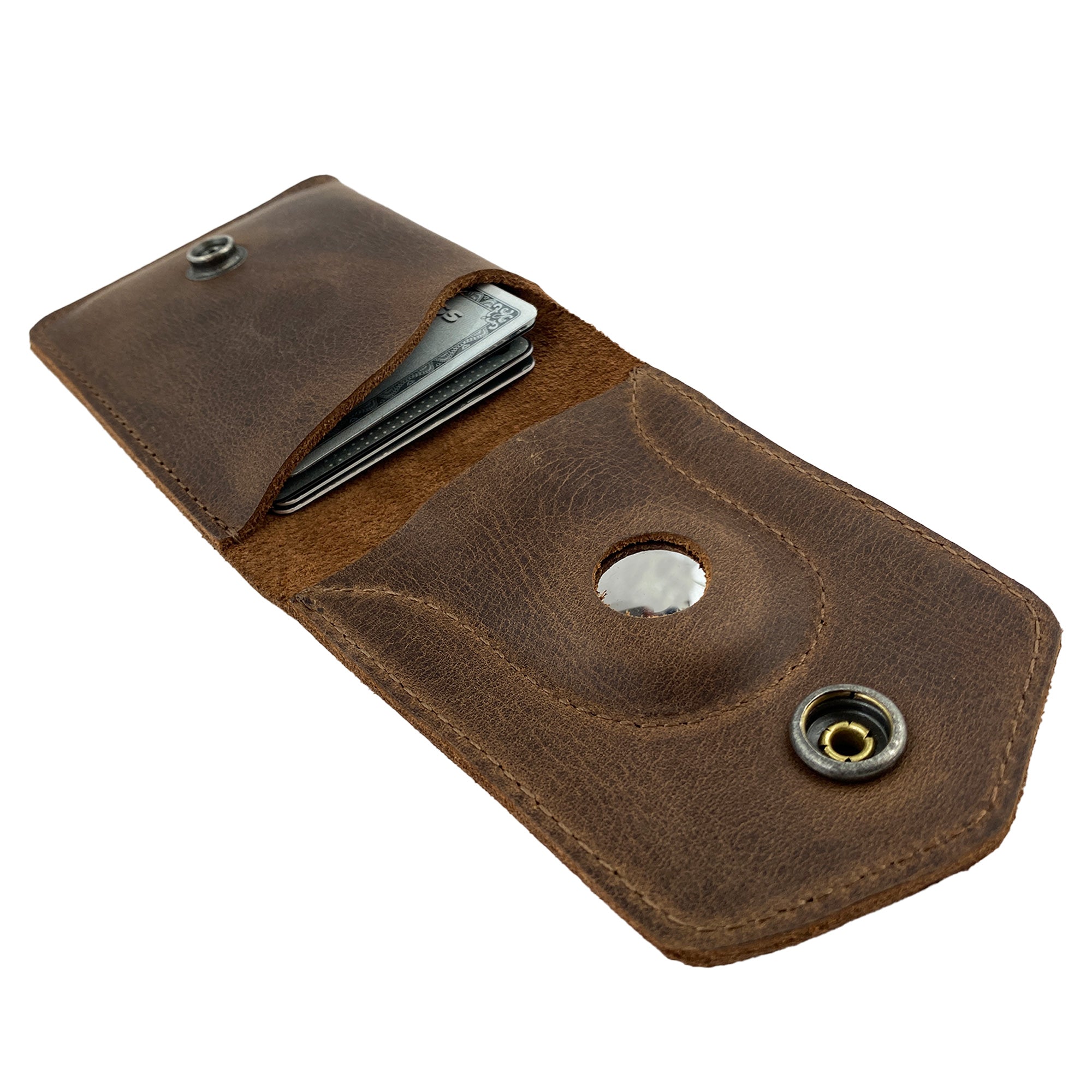 Open view of the Card Holder with AirTag Slot by LeatherTex, featuring its unique design for effective organization. This elegant and durable full grain leather travel accessory is perfect for cash and cards. It's a handmade product from La Antigua Guatemala, emphasizing small batch production and artisan craftsmanship.