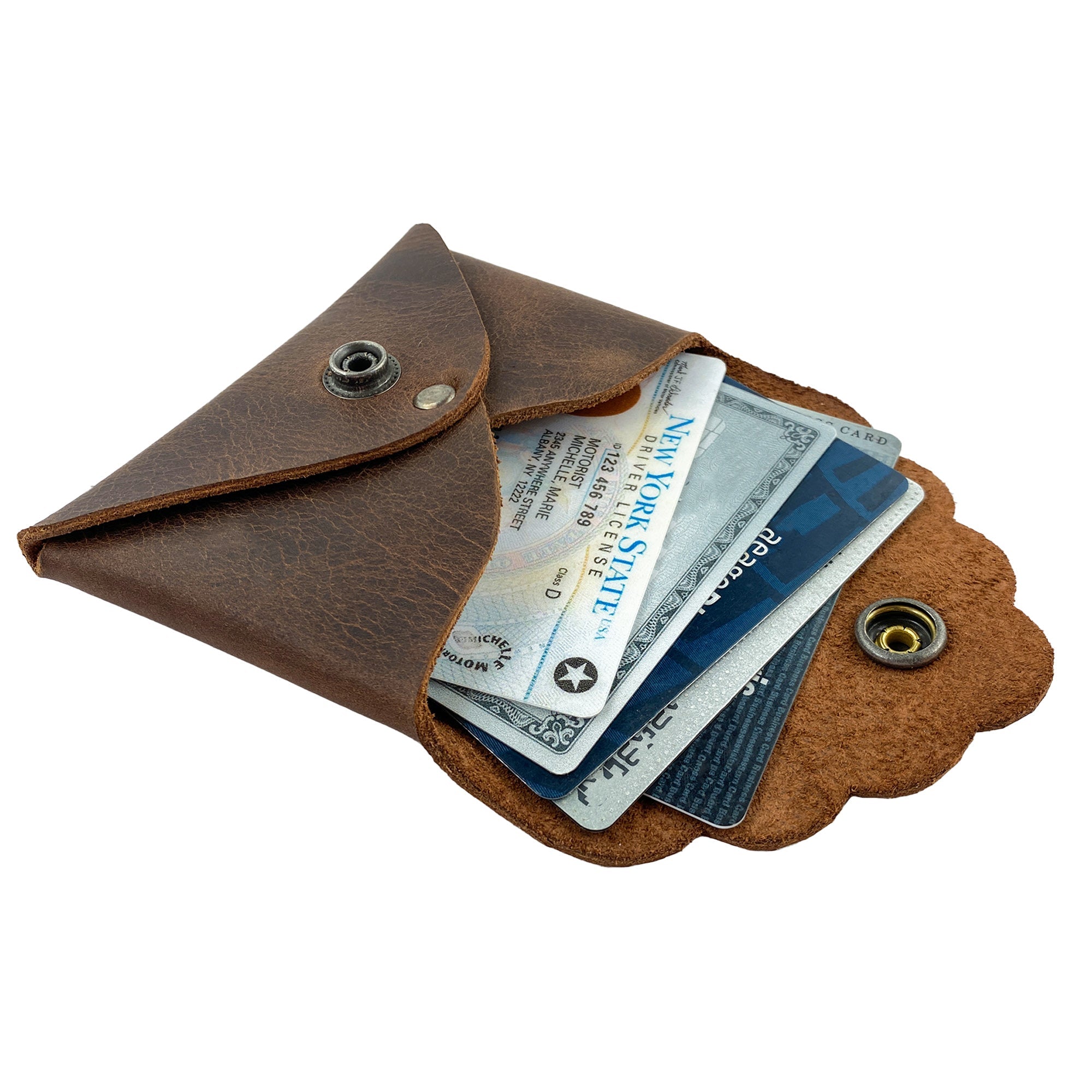 Dimensions of the Stylish Envelope by Heather's, illustrating its compact size and usability. Ideal for organizing debit and credit cards, this classy envelope card holder is constructed from durable full grain leather, showcasing hand cut and hand sewn craftsmanship along with fire branding, handmade in La Antigua Guatemala & Oaxaca Mexico.